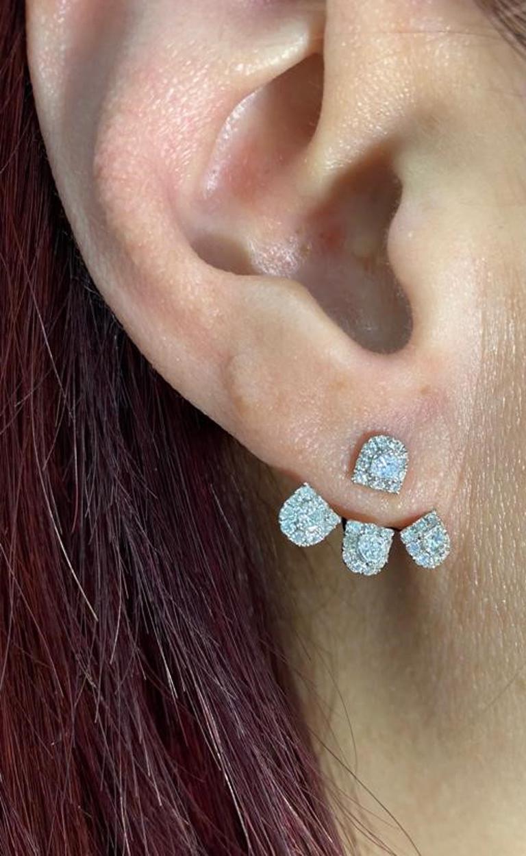 This earring features 8 shield shape diamonds weight 1.32 carats, shield shape diamonds are outlined with 0.65 carat of white round diamonds. There are 3 holes at the back of earrings, it can be adjusted to three different length to fit your