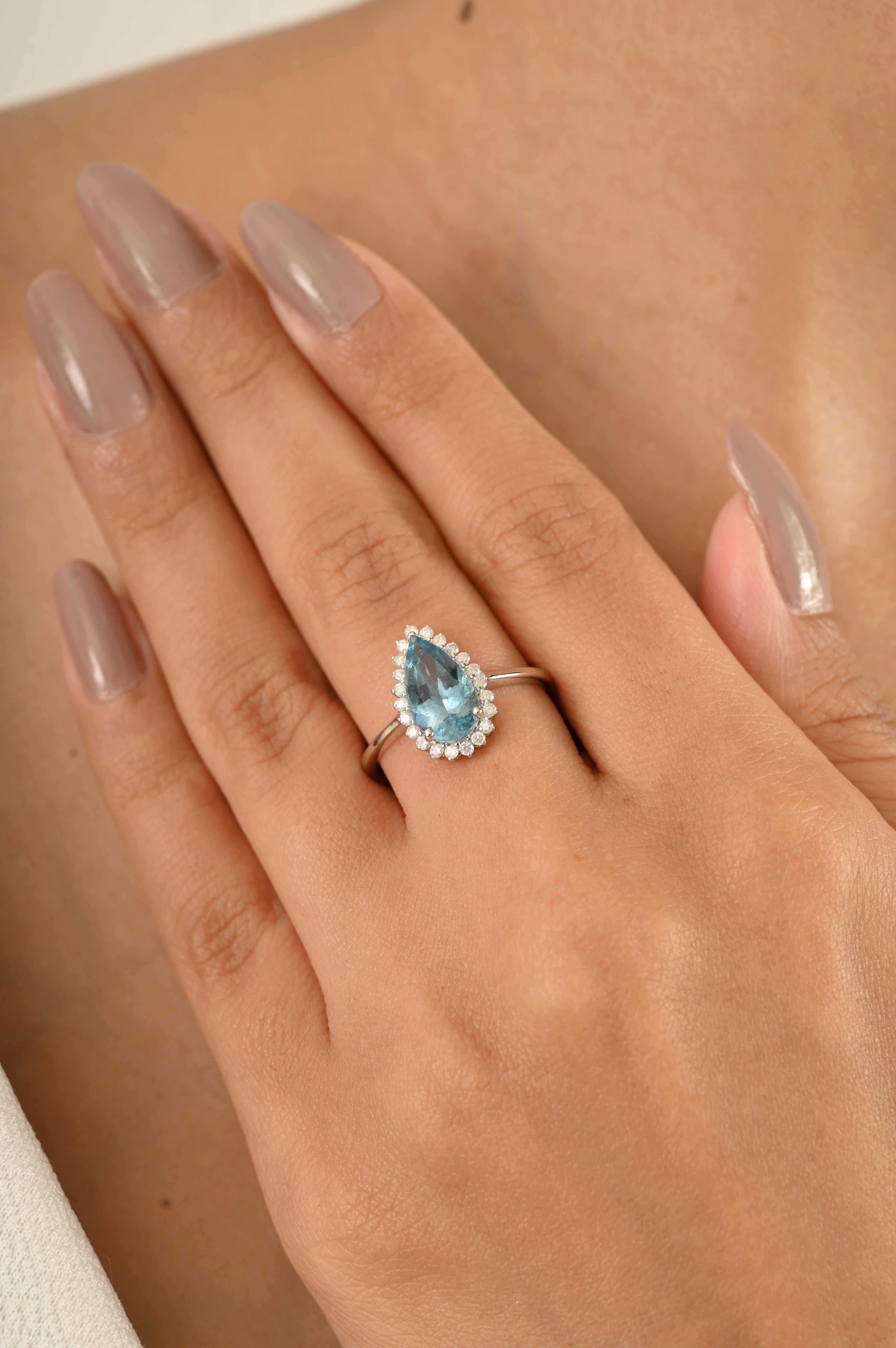 En vente :  1.32 CTW Aigue-marine en forme de poire et bague de fiançailles en or blanc 14k avec halo de diamants 10