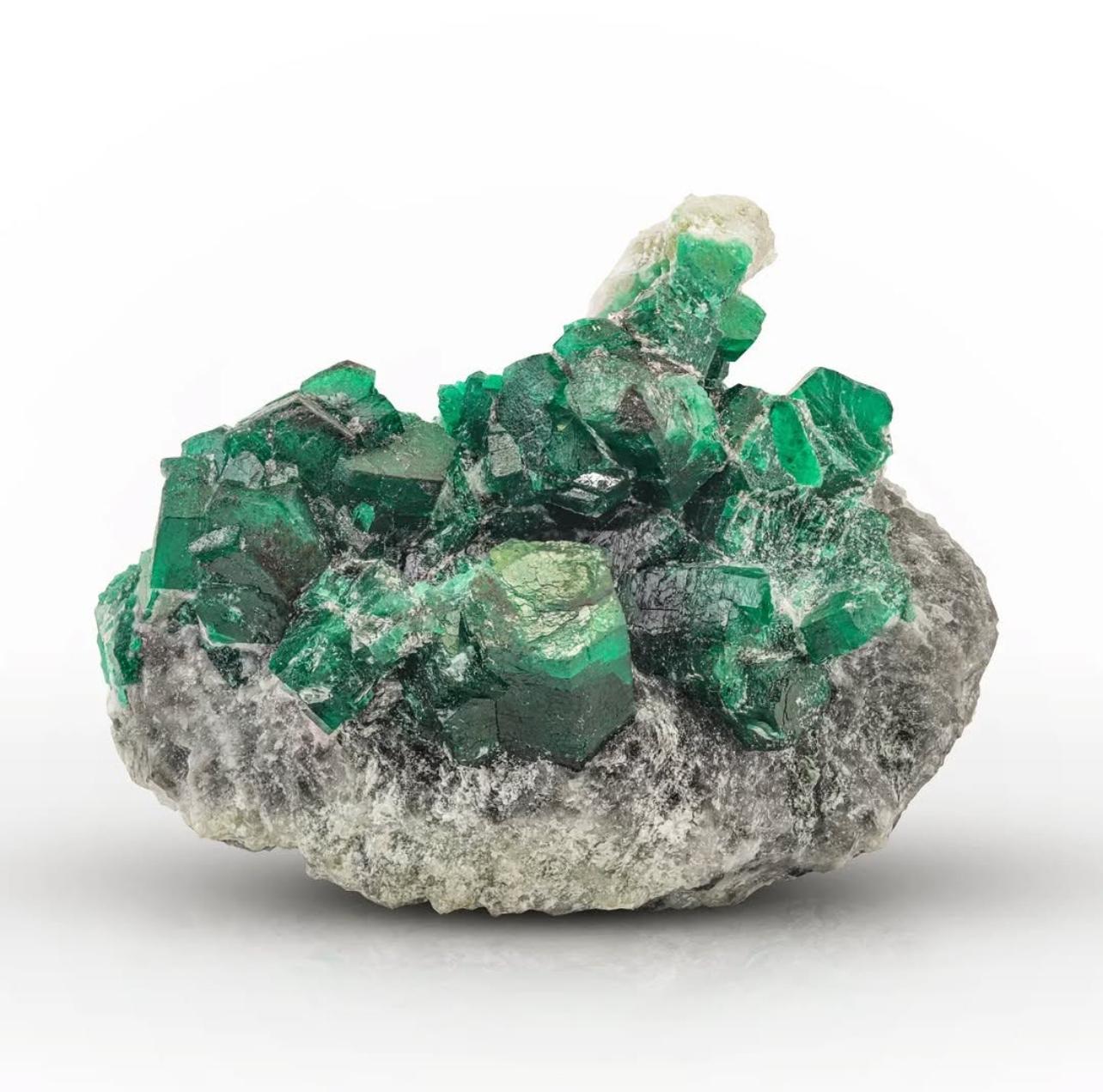 Product Information:

Specimen Type: Emerald Crystals on Calcite

Weight: 132 grams

Dimension: H: 5 x W: 6.5 x D: 4 cm

Origin: Swat Valley, KPK Province, Pakistan

Treatment: None

Description: 

This exquisite specimen features a striking,