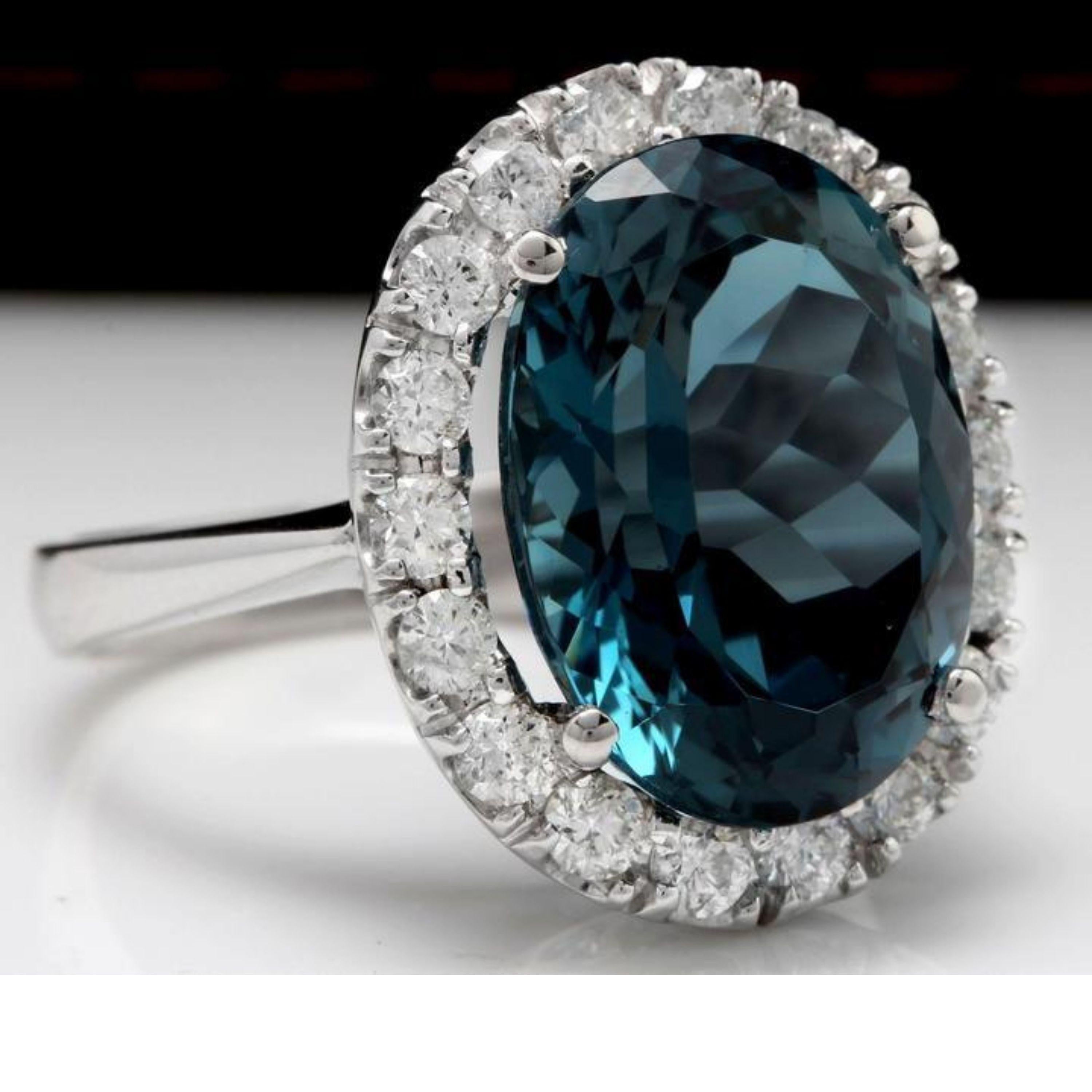 13.20 Carats Natural Impressive London Blue Topaz and Diamond 14K White Gold Ring

Total Natural London Blue Topaz Weight: 12.00 Carats

London Blue Topaz Measures: 16.00 x 12.00mm

Natural Round Diamonds Weight: 1.20 Carats (color G / Clarity