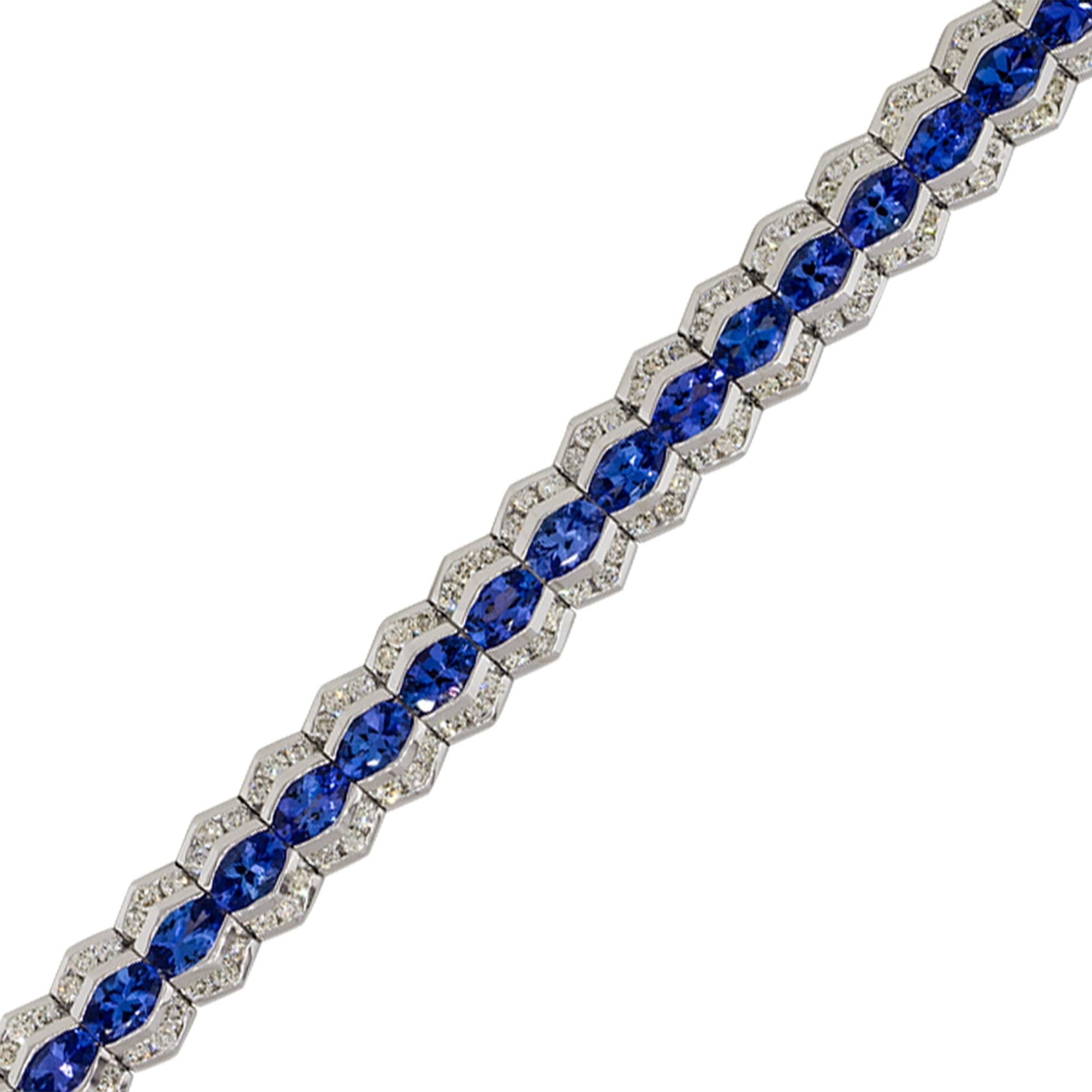 Material: 14k White Gold
Gemstone details: Approx. 13.20ctw of Tanzanite gemstones
Diamond details: Approx. 4.40ctw of round cut Diamonds. Diamonds are G/H in color and VS in clarity
Clasps: Tongue in box
Total Weight: 34.7g (22.3dwt) 
Bracelet