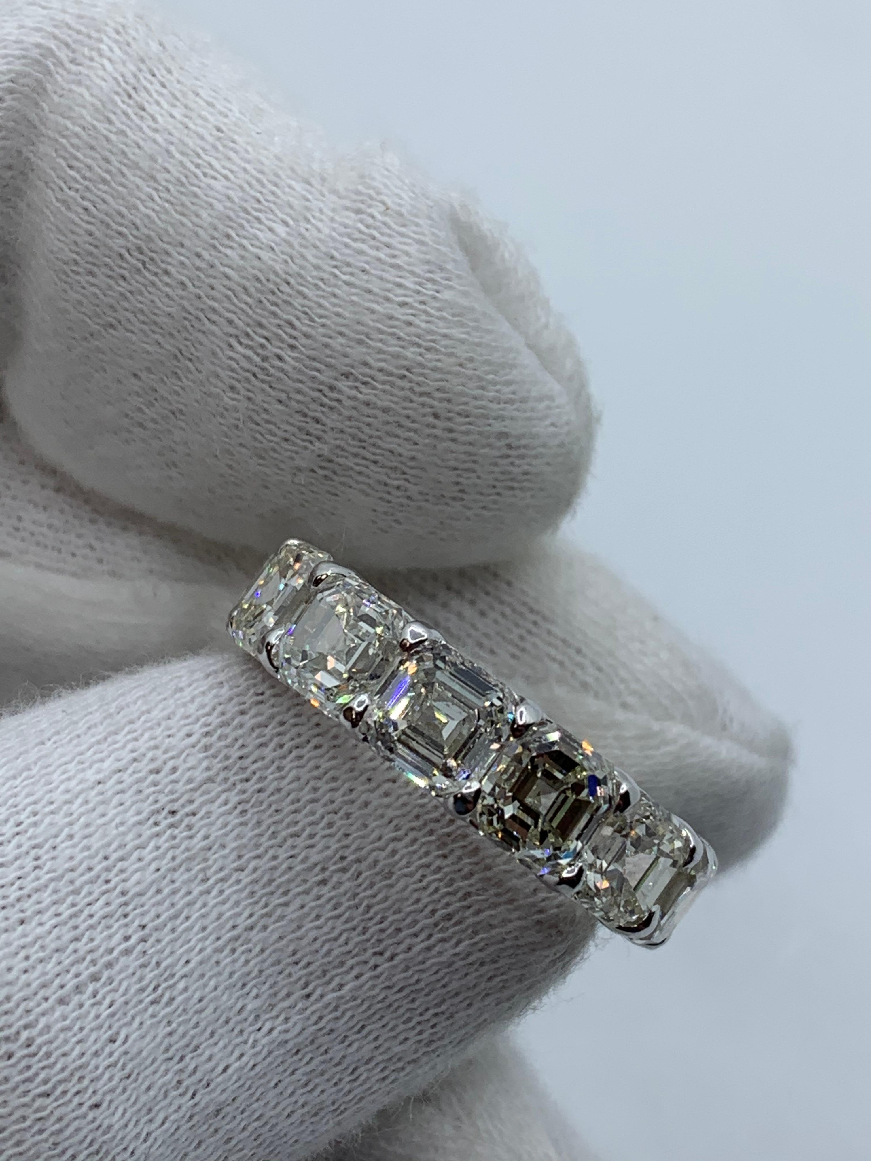 This beautiful Eternity Ring is set with 13 perfectly matched Asscher Cut Diamonds, each weighing between 1.0ct to 1.04ct for a total of 13.22 Carats. Made in New York City using Platinum 950. Fits US Size 6.5.

Diamonds are of I-J color and VS-VVS