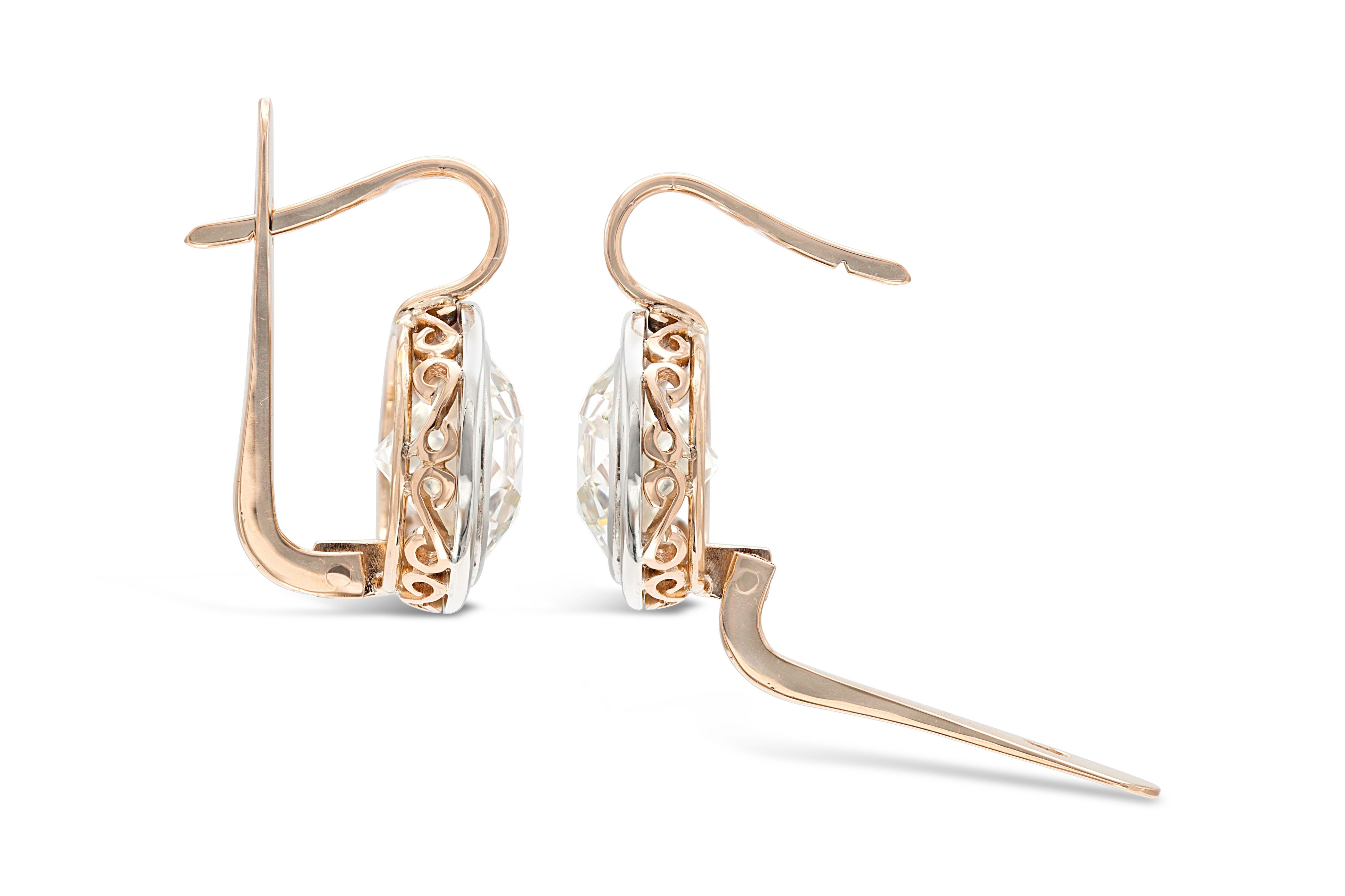 two diamond drop earrings