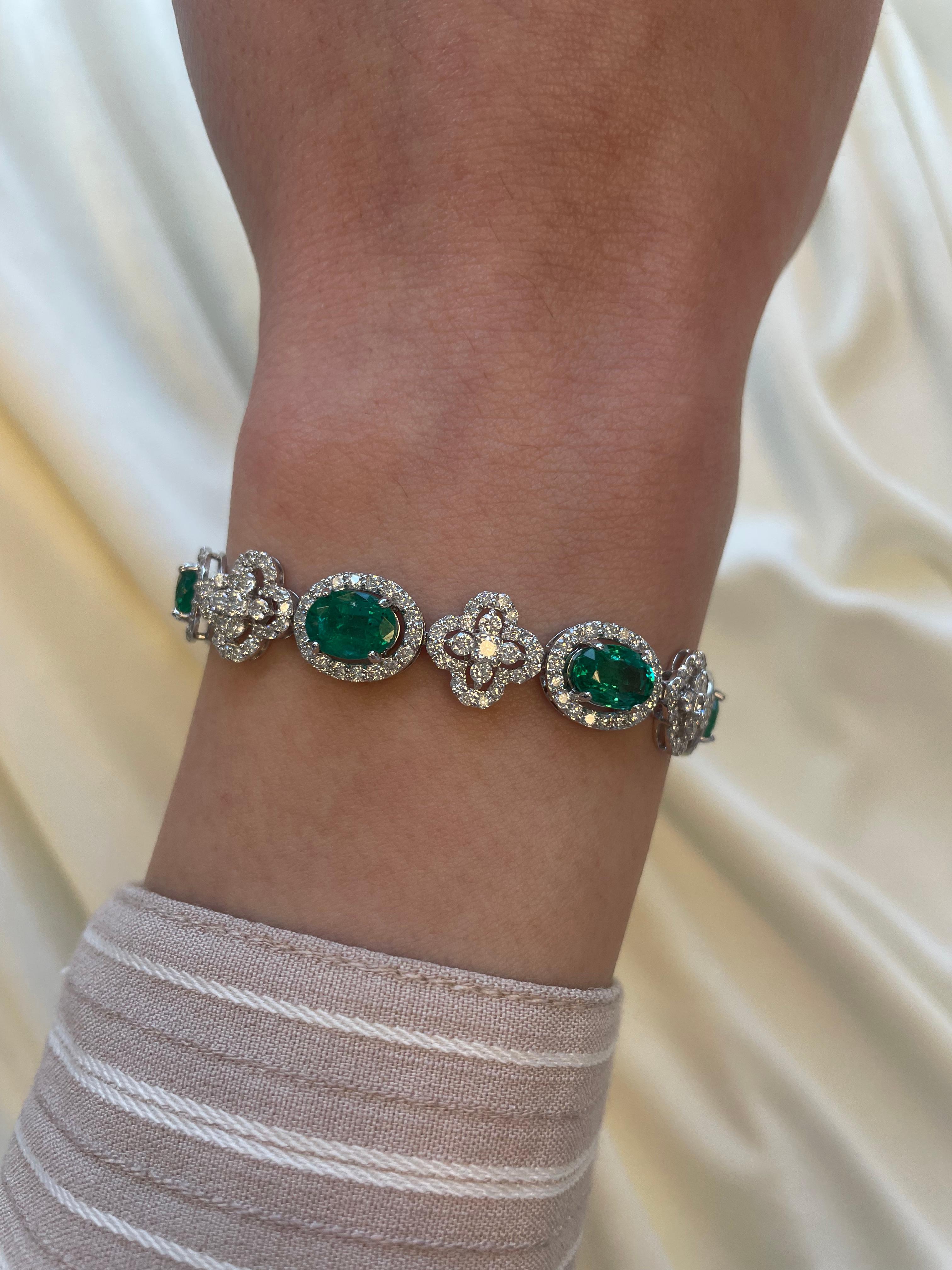 Exquisite and elegant emerald and diamond bracelet.
13.25 carats total gemstone weight.
8 oval cut emeralds, approximately F2, 8.27 carats. Complimented by 347 round brilliant diamonds, 4.98 carats. Approximately G/H color and SI clarity. 18k white
