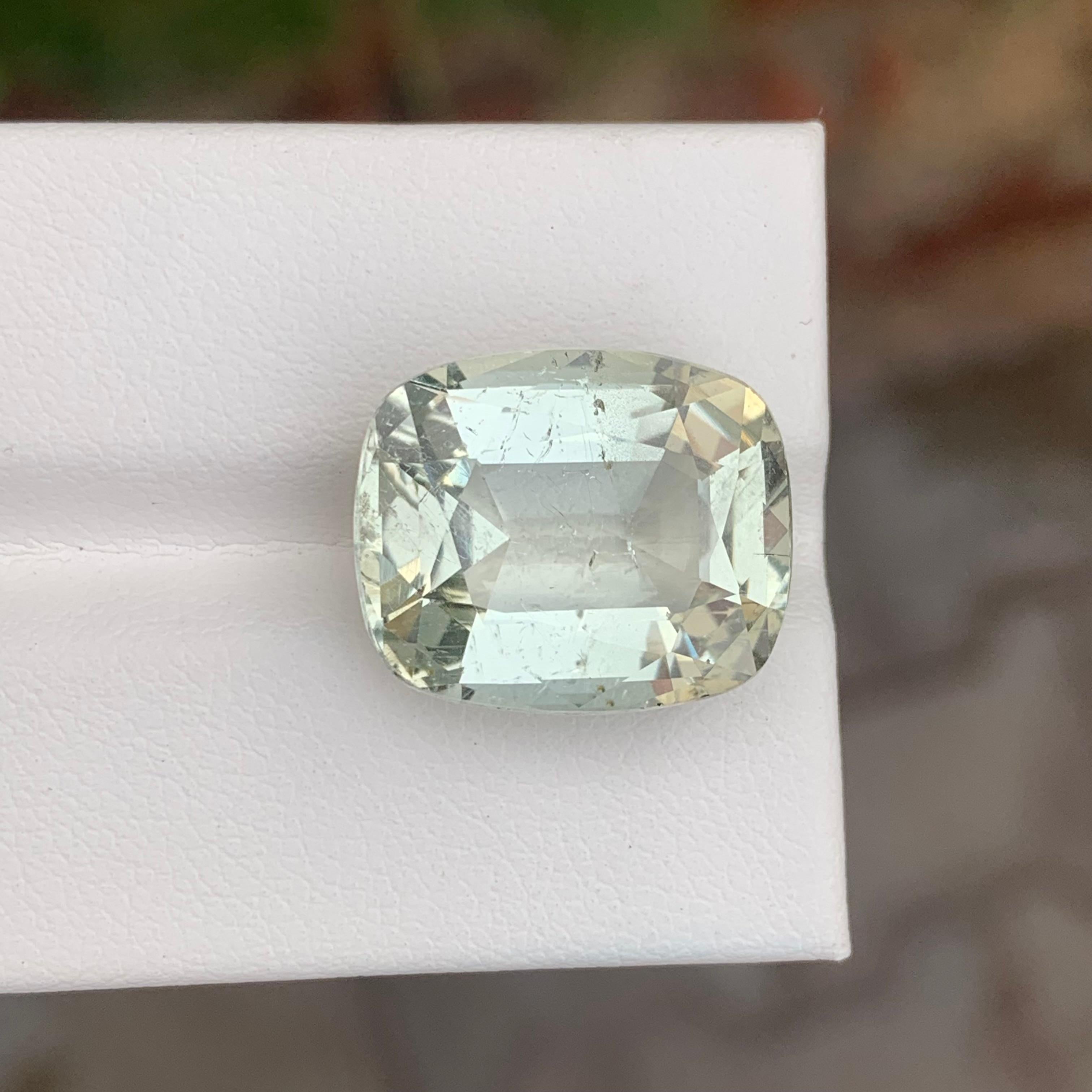 Loose Heliodor 

Weight: 13.25 Carats
Dimension: 17.3x14.3x8.5 Mm
Shape: Cushion
Color: Light Yellow
Origin: Skardu, Pakistan 
Certificate: On Customer Demand

Heliodor, also known as golden beryl, is a radiant yellow to greenish-yellow gemstone