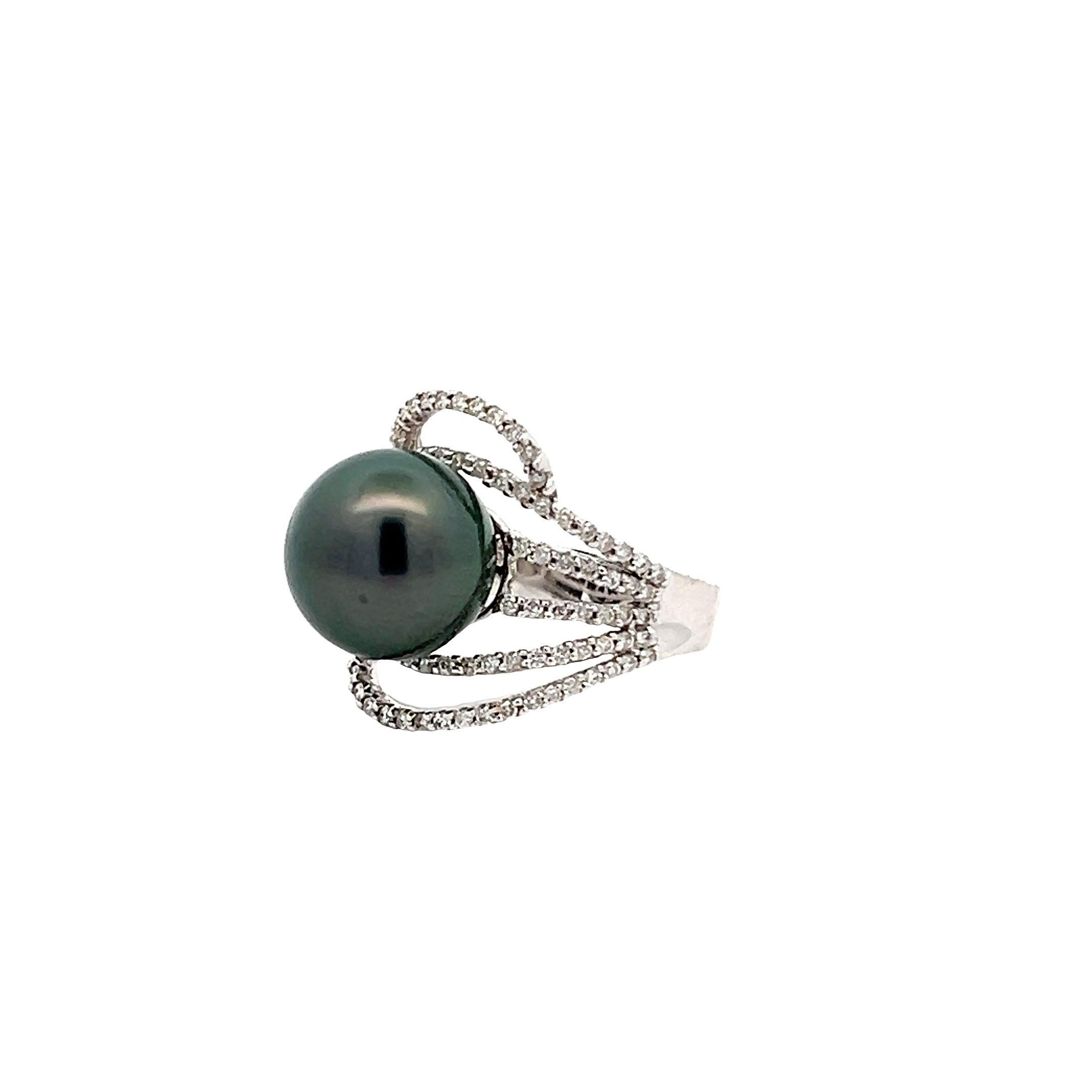 Stunning Tahitian cocktail ring. High luster with purple overtone, 13.25mm Tahitian pearl accented with round brilliant cut diamonds. Handcrafted design set in 14 karats white gold.

Tahitian pearl: 13.25mm, high luster, purple overtone
Diamond: