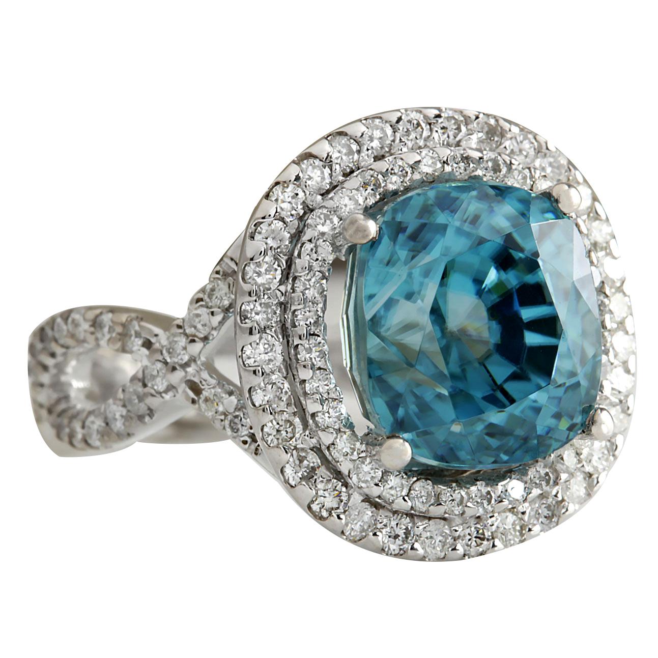Stamped: 14K White Gold
Total Ring Weight: 10.4 Grams
Total Natural Zircon Weight is 12.12 Carat (Measures: 11.00x9.00 mm)
Color: Blue
Total Natural Diamond Weight is 1.16 Carat
Color: F-G, Clarity: VS2-SI1
Face Measures: 16.95x15.80 mm
Sku: