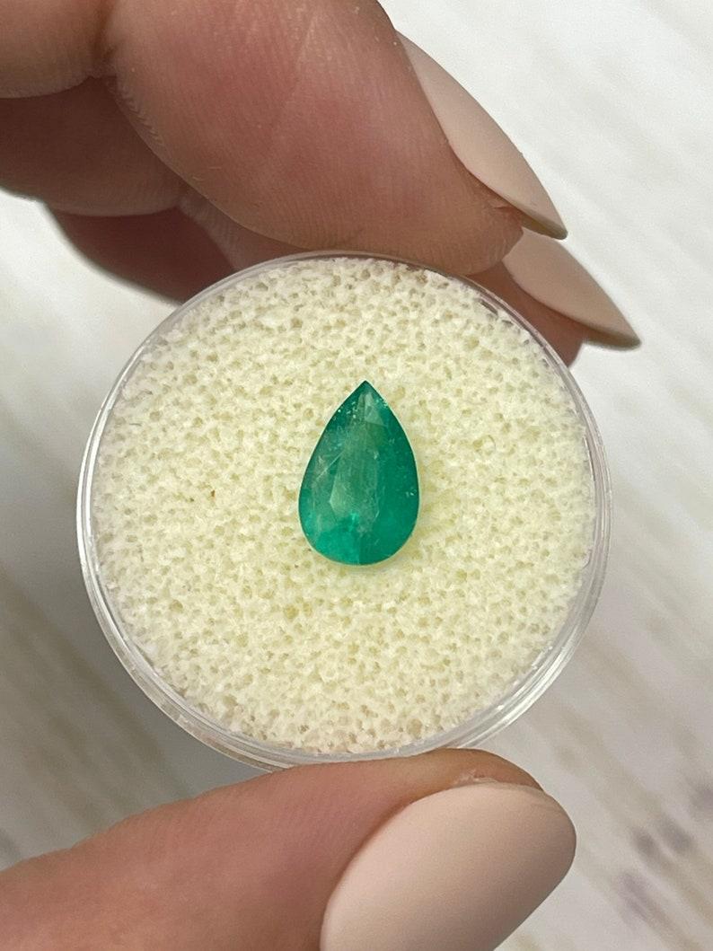 Stone: Emerald
Weight: 1.32-carats
Shape: Pear Cut
Clarity: Semi-Transparent
Luster: Good
Color: Medium Light Green
Measurements: 10mm x 6.51mm x 4.23mm
Geographic Origin: Colombia
Treatment: Natural, Oiling

Comments: Due to their growth conditions