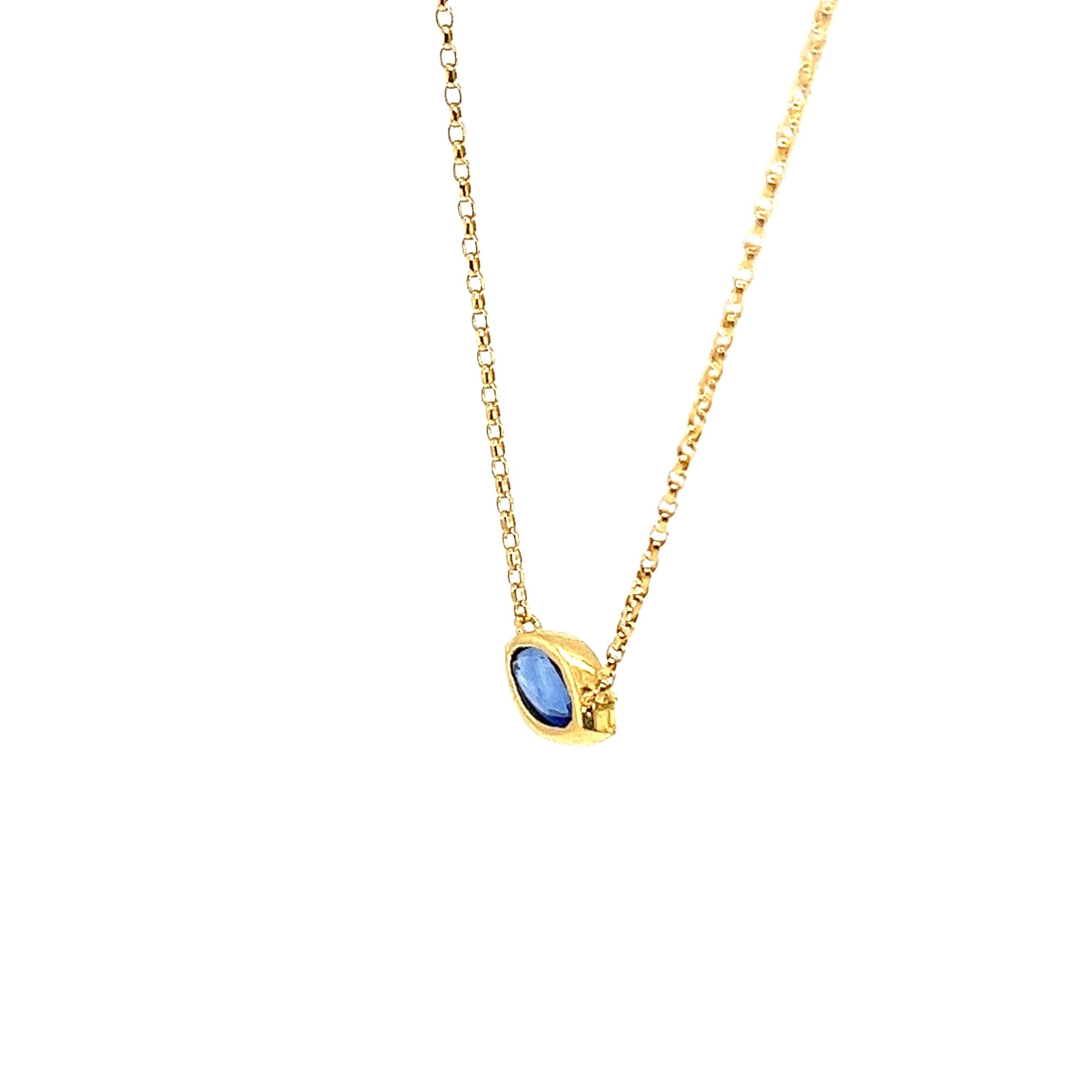 This beautiful marquise shape Sapphire is set in a classic 18ct Yellow Gold pendant setting. The marquise shape is a great alternative to the traditional round cut. It's elliptical shape gives the illusion of a larger stone. Suspended on 16