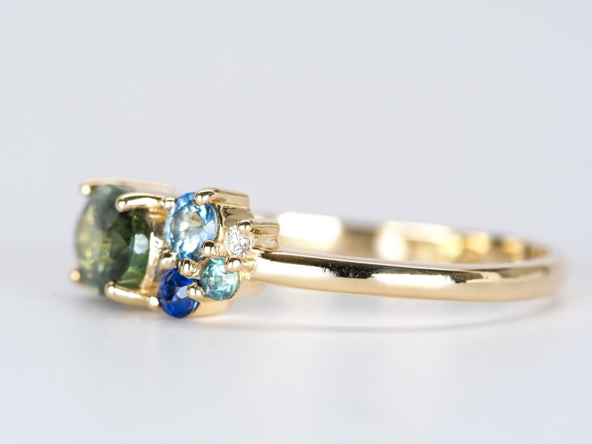 ♥ 1.32ct Nigerian Sapphire Cluster Ring 14K Yellow Gold Tanzanite Aquamarine Alexandrite Diamond
♥ Solid 14k yellow gold ring set with a beautiful oval-shaped sapphire
♥ Gorgeous blue green color!
♥ The item measures 6.02 mm in length, 16.7 mm in