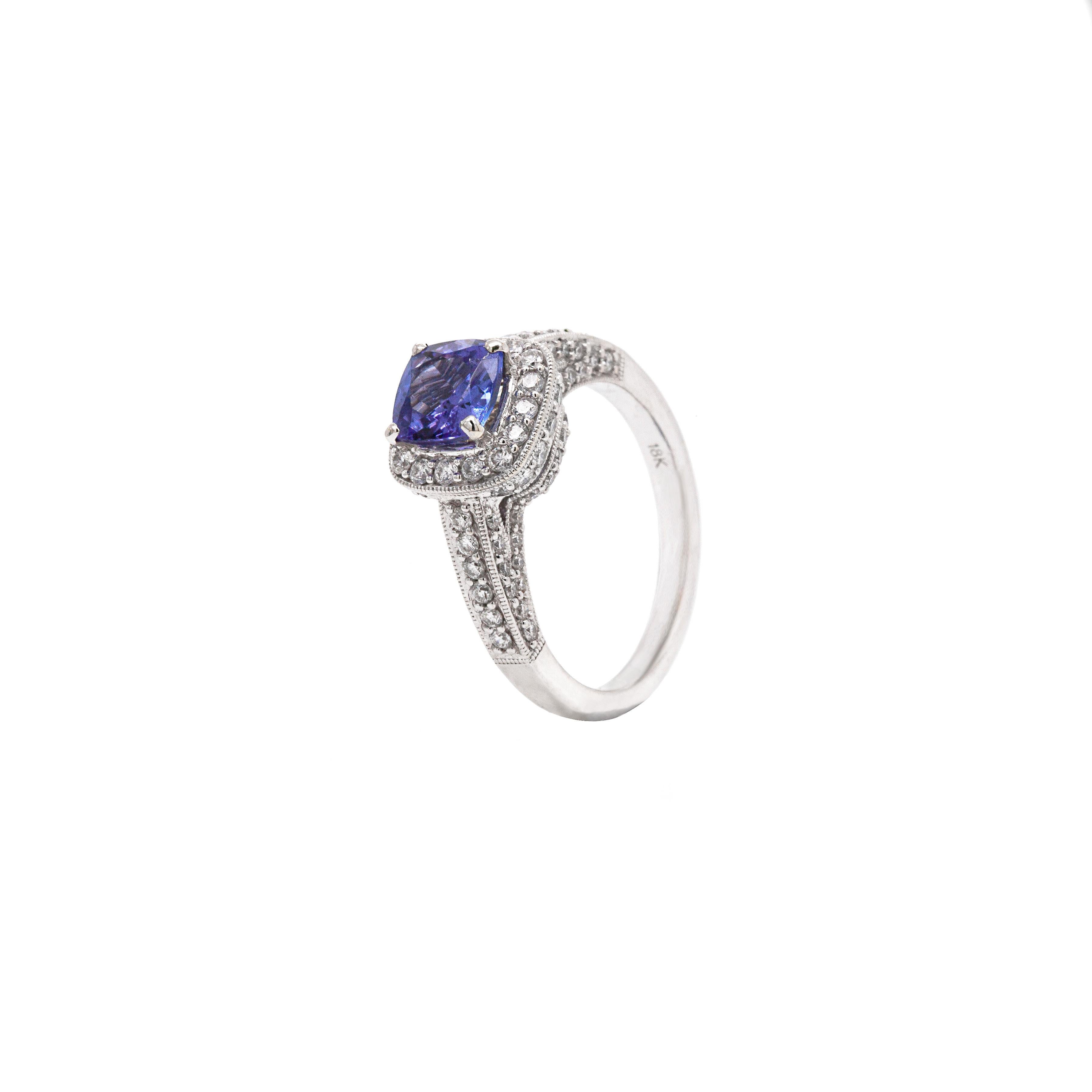 Modern 1.32ct Tanzanite and Diamond 18 Carat white Gold Halo Cluster Engagement Ring For Sale