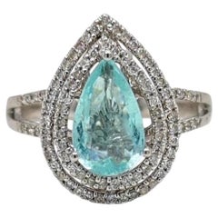 Anillo de turmalina Paraíba de color azul-verde neón intenso, de 1,32 ct, en oro blanco de 18 quilates, con certificado