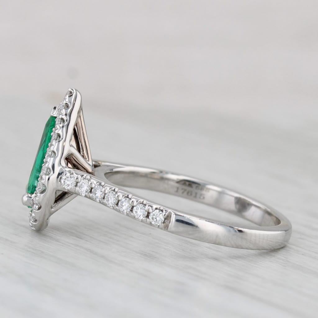 Gemstone Information:
- Natural Emerald -
Carats - 0.96ct (6 x 9.5 mm) 
Cut - Pear
Color - Green
Treatment - Oiling

- Natural Diamonds -
Total Carats - 0.36ctw
Cut - Round Brilliant
Color - F - G
Clarity - VS2 - SI1

Metal: 14k White Gold
Weight: