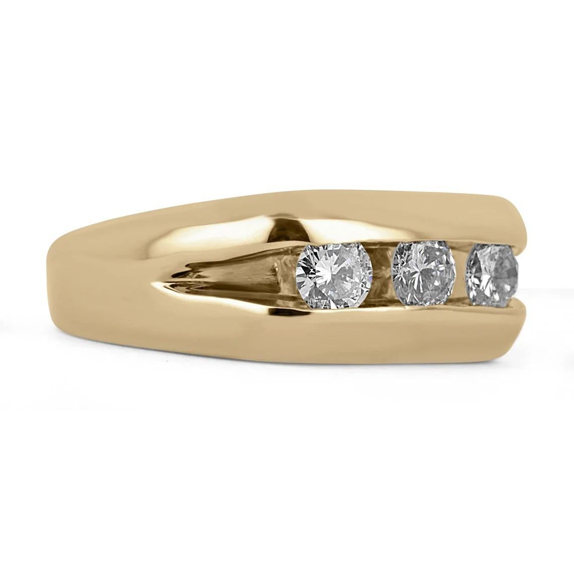 A beautiful three-stone diamond men's ring. Three, large, brilliant round cut diamonds tension set in a solid 14K yellow gold setting. The perfect statement piece, unisex as well.

Setting Style: Tension
Setting Material: 14K Yellow Gold
Setting