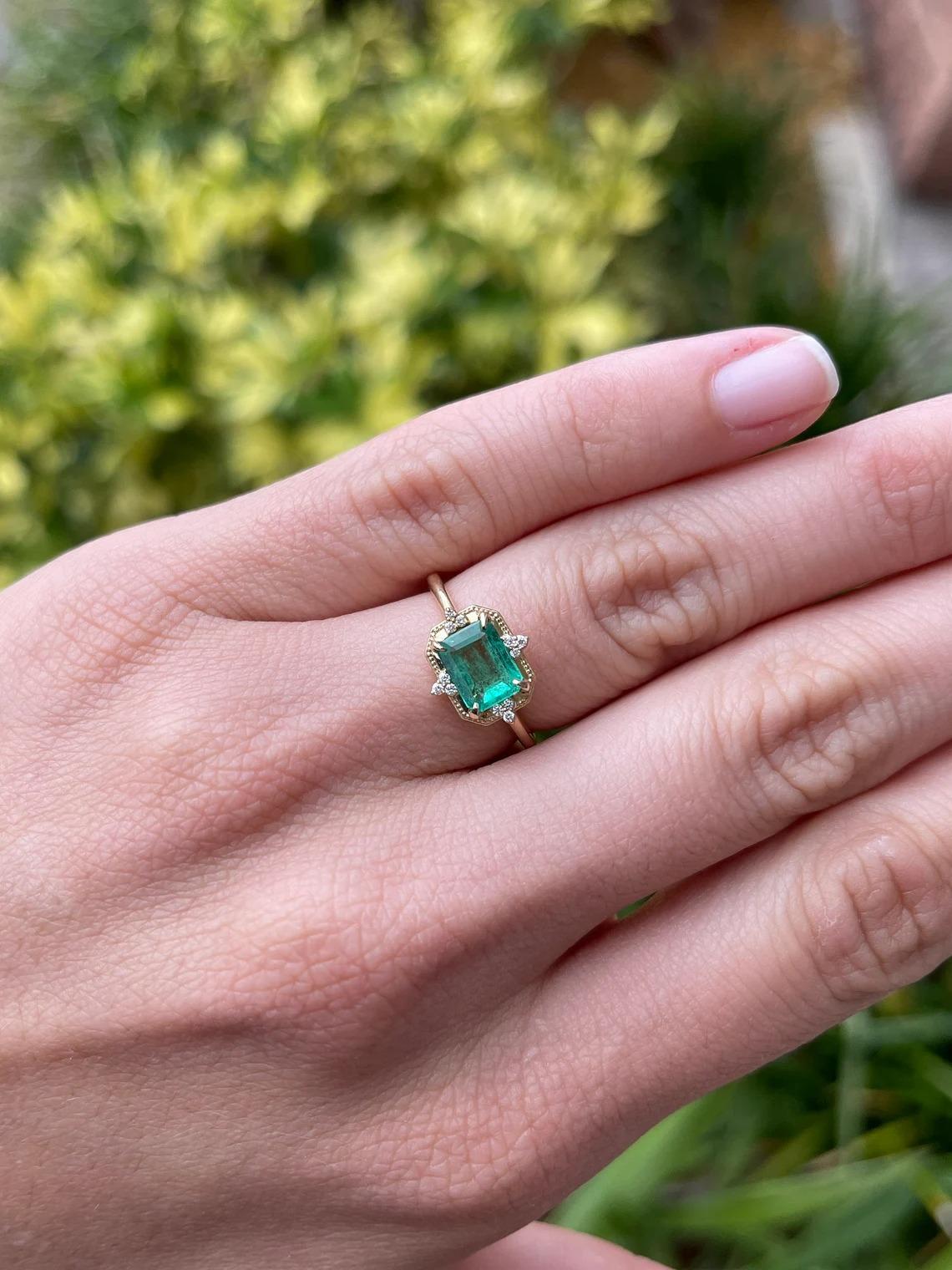 diamond ring with emerald accents