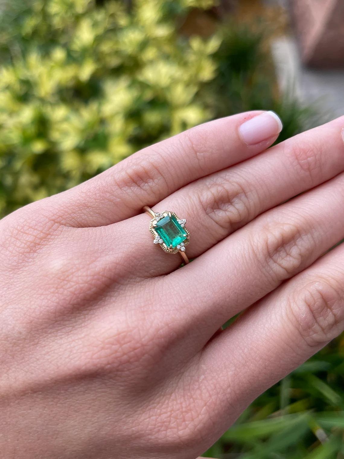 diamond engagement ring with emerald accents
