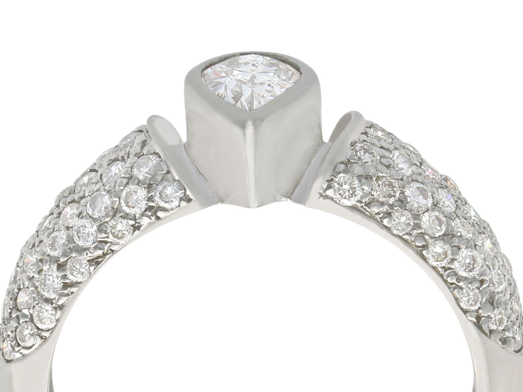 A fine and impressive vintage 1.33 carat diamond and 18 karat white gold dress ring; part of our diverse gemstone jewelry collections.

This fine and impressive vintage diamond band ring has been crafted in 18k white gold.

The ring has a domed