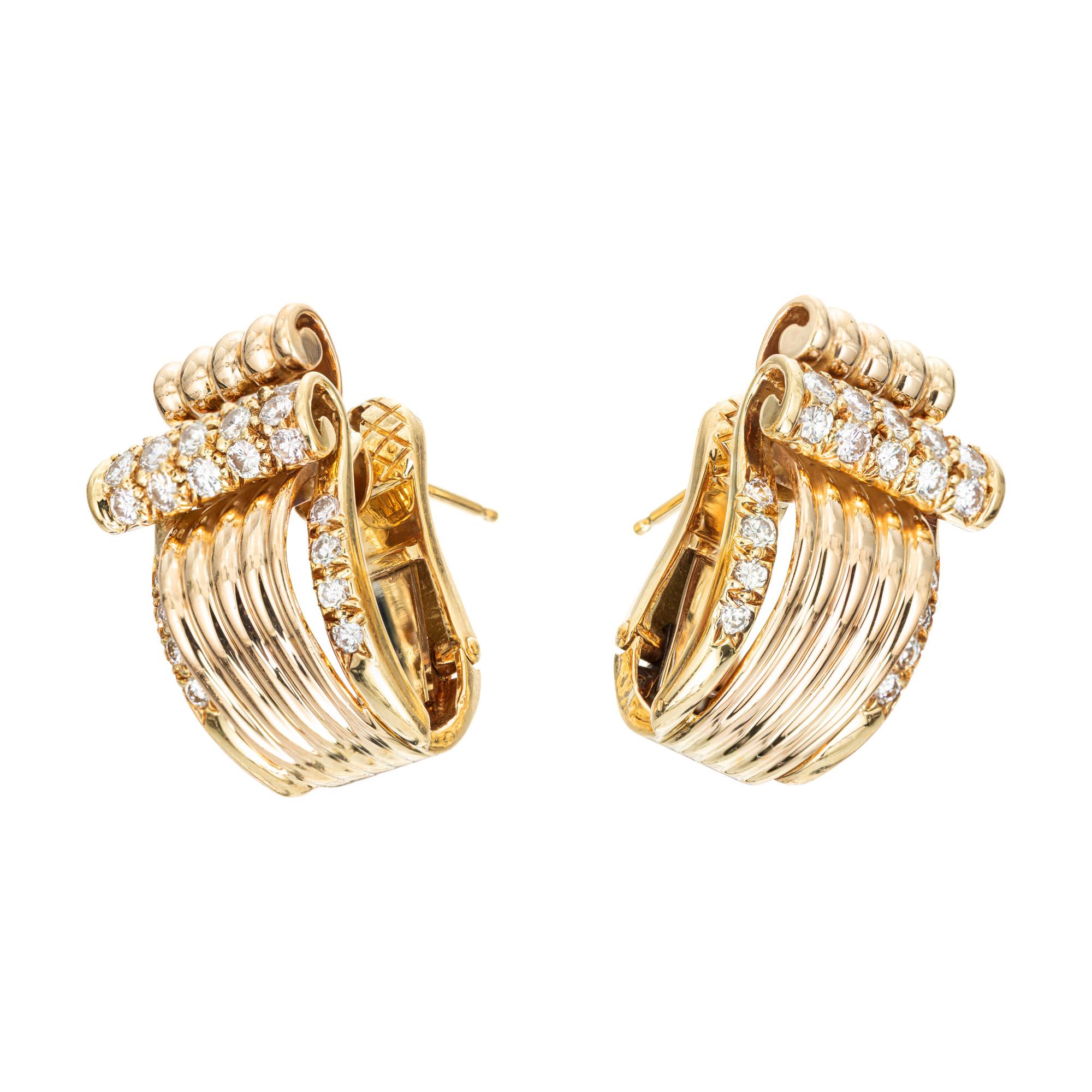Glamours 1940's gold double 3-D swirl design diamond clip post earrings. Featuring 46 full cut diamonds set in 18k yellow gold crafted settings with heavy secure clips and posts. Elegant and timeless.  

46 full cut diamonds, approx. total weight