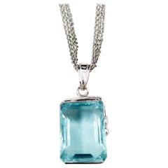 13.3 Carat Emerald Cut Blue Topaz Simple Pendant in 18K White Gold