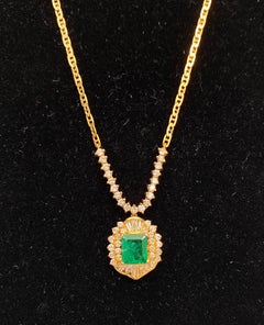 1.33 Carat Emerald-Cut Colombian Emerald, Diamond and 18 Karat Gold Pendant