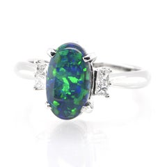 1.33 Carat Natural Australian Black Opal Three-Stone Ring Set in Platinum