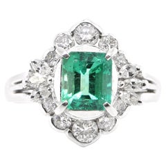 Vintage 1.33 Carat Natural Emerald and Diamond Ring Set in Platinum