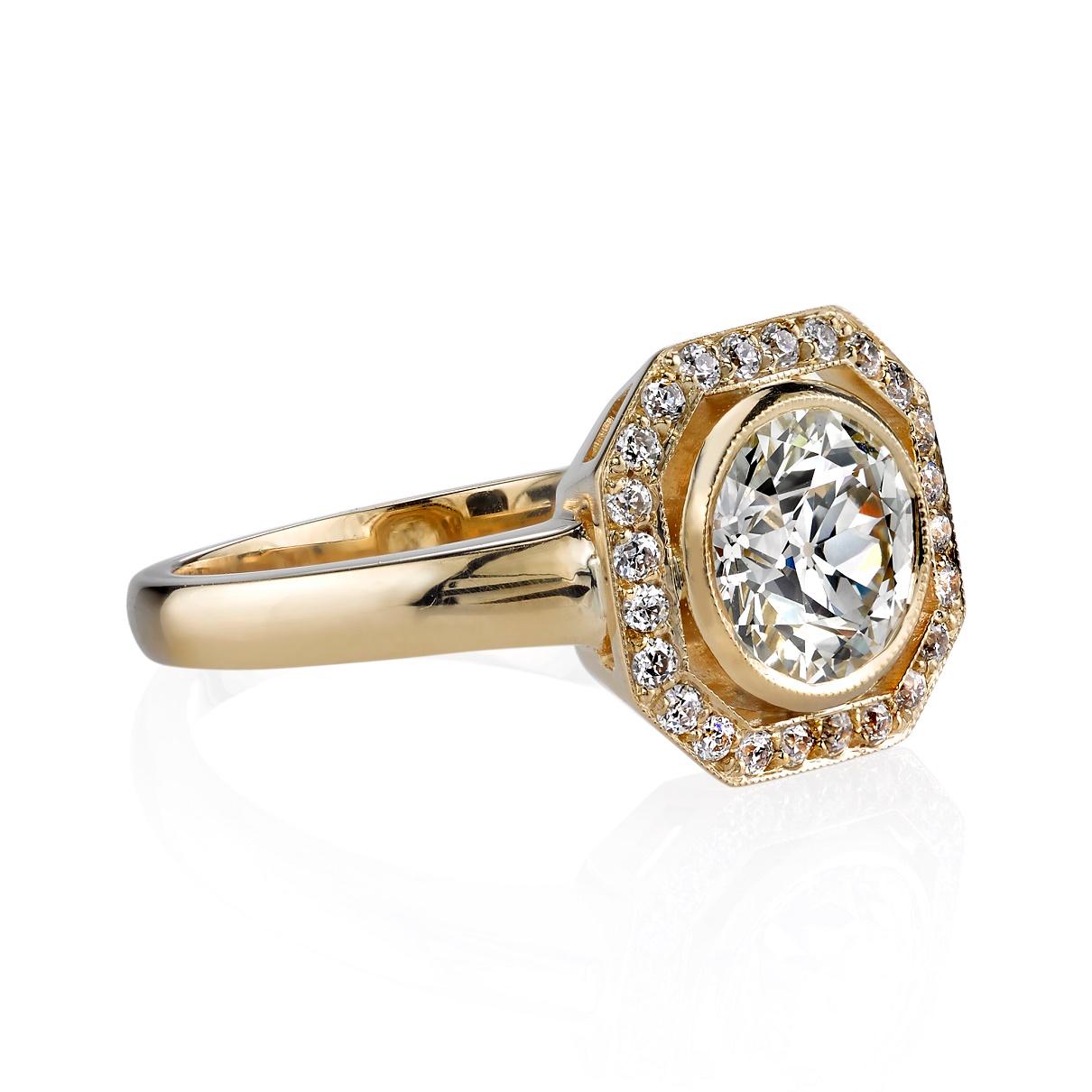 1.33ct L/VS1 GIA certified old European cut diamond with 0.19ctw old European cut accent diamonds set in a handcrafted 18k yellow gold mounting. 

Ring is currently size 6. Please contact us about potential re-sizing.

Our jewelry is made locally in