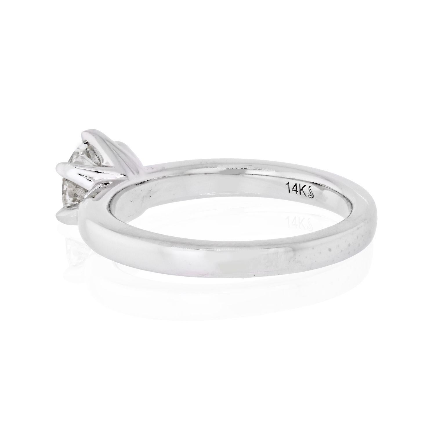 This solitaire style engagement ring is the perfect marriage of modern and vintage. It features a 1.33 carat Old European Cut diamond in a modern 14 karat, 2.5mm wide white gold setting. The diamond, has J color and SI1 clarity certified by GIA and