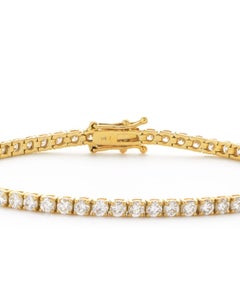 Bracciale Riviera con diamante rotondo da 1,33 carati in oro 18 carati e linea tennis a quattro griffe