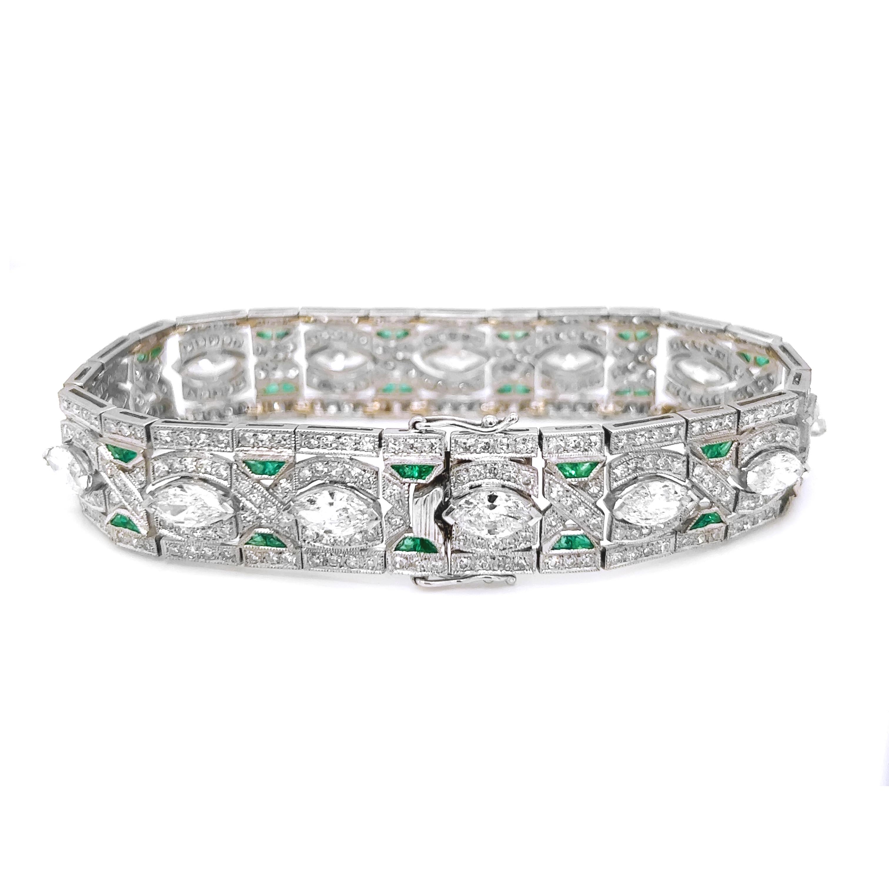The 13.30 Carat Natural Mined Round Marquise Diamond/Emerald Art Deco Platinum bracelet is an extraordinary piece of jewelry that stands out for several compelling reasons:

1. Carat Weight- The centerpiece of this ring is a substantial 13.30-carat