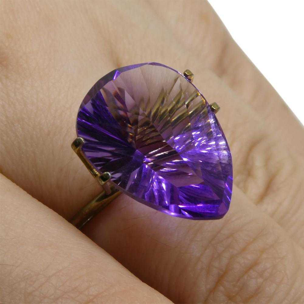 Description:

Gem Type: Amethyst
Number of Stones: 1
Weight: 13.3 cts
Measurements: 20.00 x 15.00 x 10.20 mm
Shape: Pear
Cutting Style Crown: Modified Brilliant
Cutting Style Pavilion: Mixed Cut
Transparency: Transparent
Clarity: Very Slightly