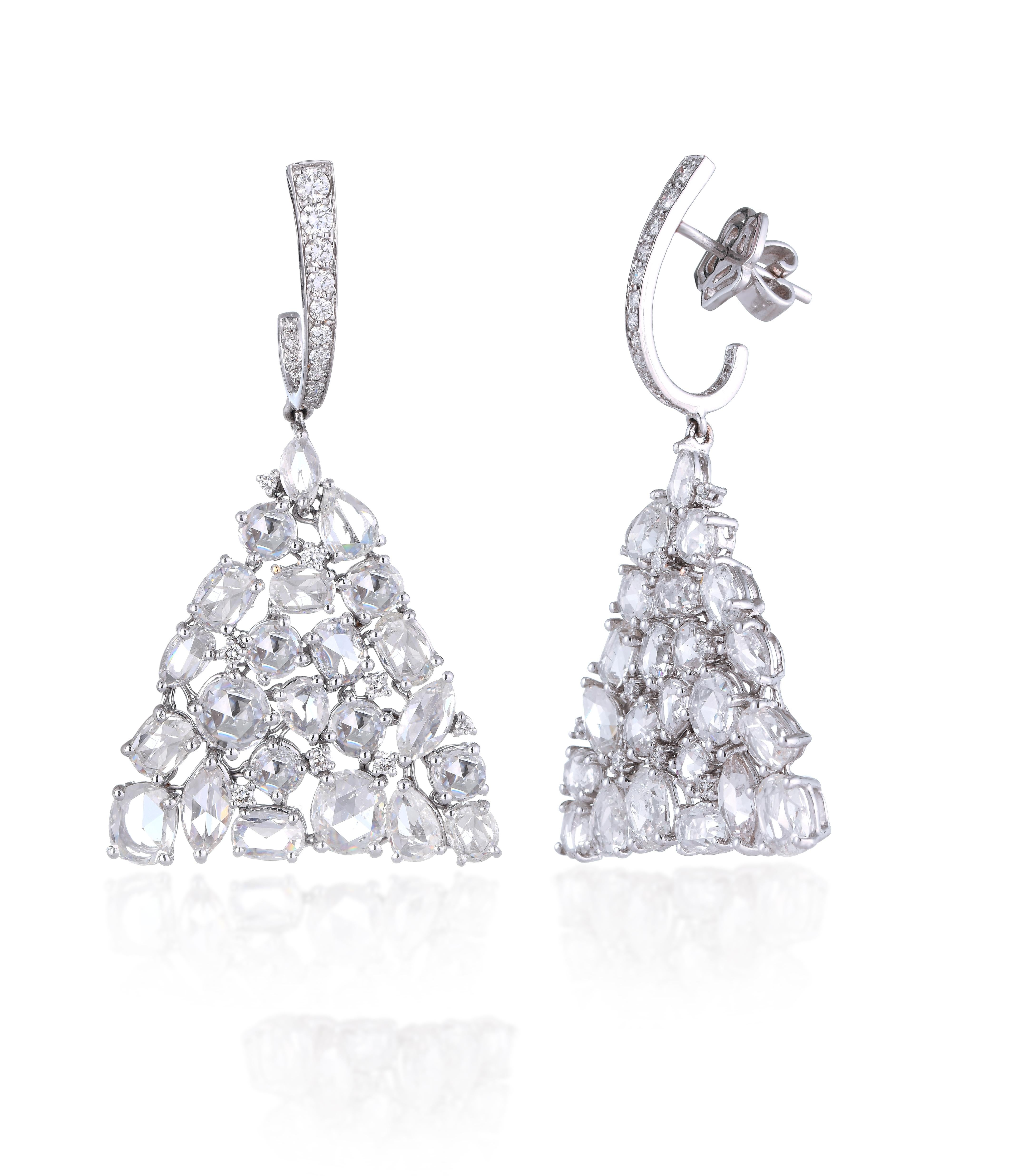 Fancy shaped rose cut diamonds coupled with full cut diamond (13.31carats) forming a remarkable pair of weightless earrings, mounted in 18kt white gold. 