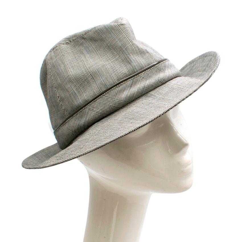 Christian Dior Grey Prince Of Wales Grey Check Hat 

- Trilby style 
- Grey prince of wales check
- Grey Acetate piping
- Silver-tone Dior logo 
- Black Dior lining 

Made in France

Dry Clean Only 

Across head 20cm
Full length across 32cm
Height