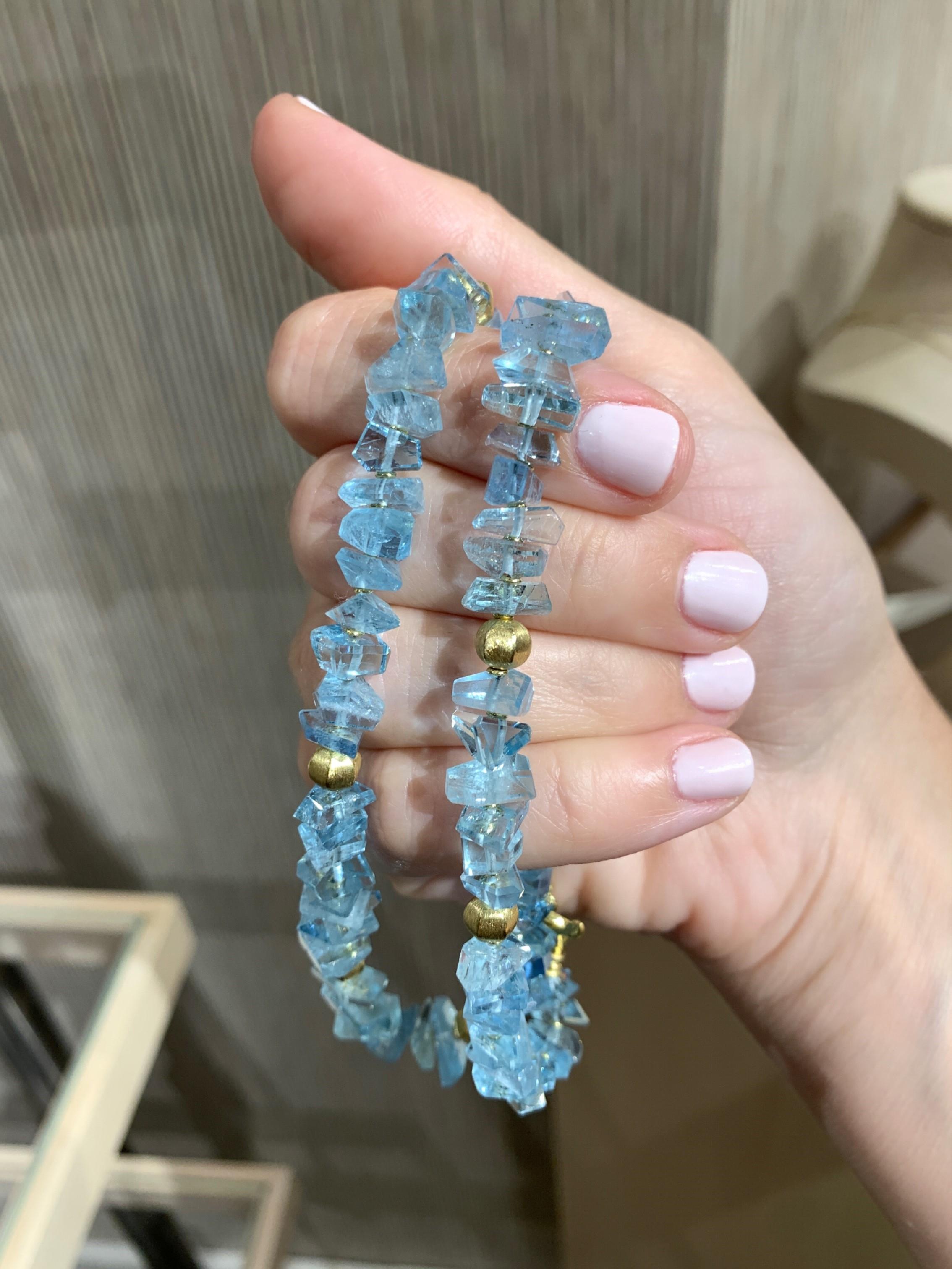 One of a Kind Facets Necklace hand-fabricated by award-winning jewelry maker Barbara Heinrich featuring 133.33 carats of magnificent faceted aquamarine accented with nine solid 18k yellow gold elements in the artist's signature-finished 18k yellow