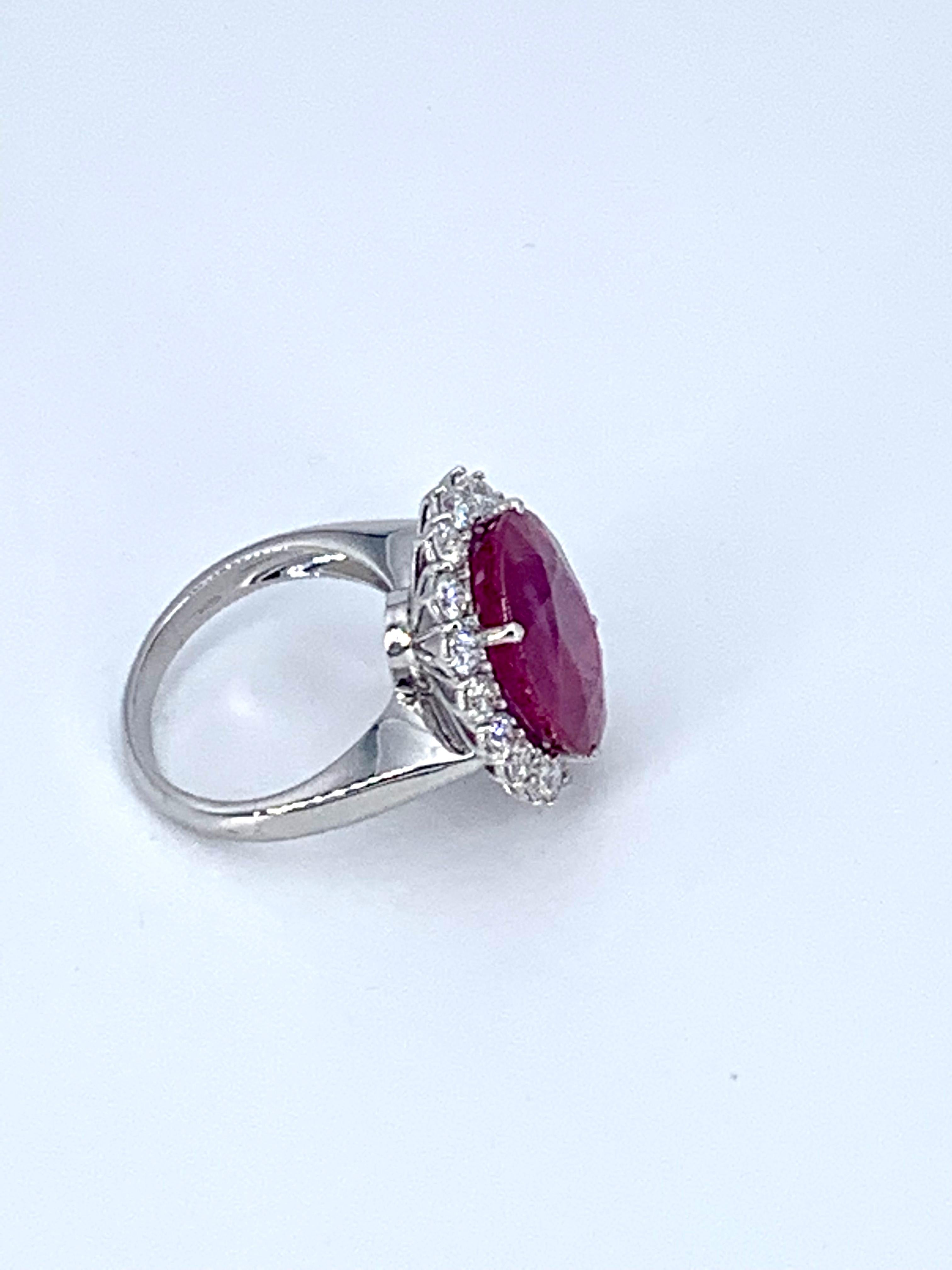 This impressive 13.35 carat Burma Ruby cocktail ring, is surrounded by 1.60 carat of natural white Diamonds, and set in an elegantly thin 18Kt white gold band.

For the lady who loves big Rubies and a ring that turns heads. 

The perfect gift for