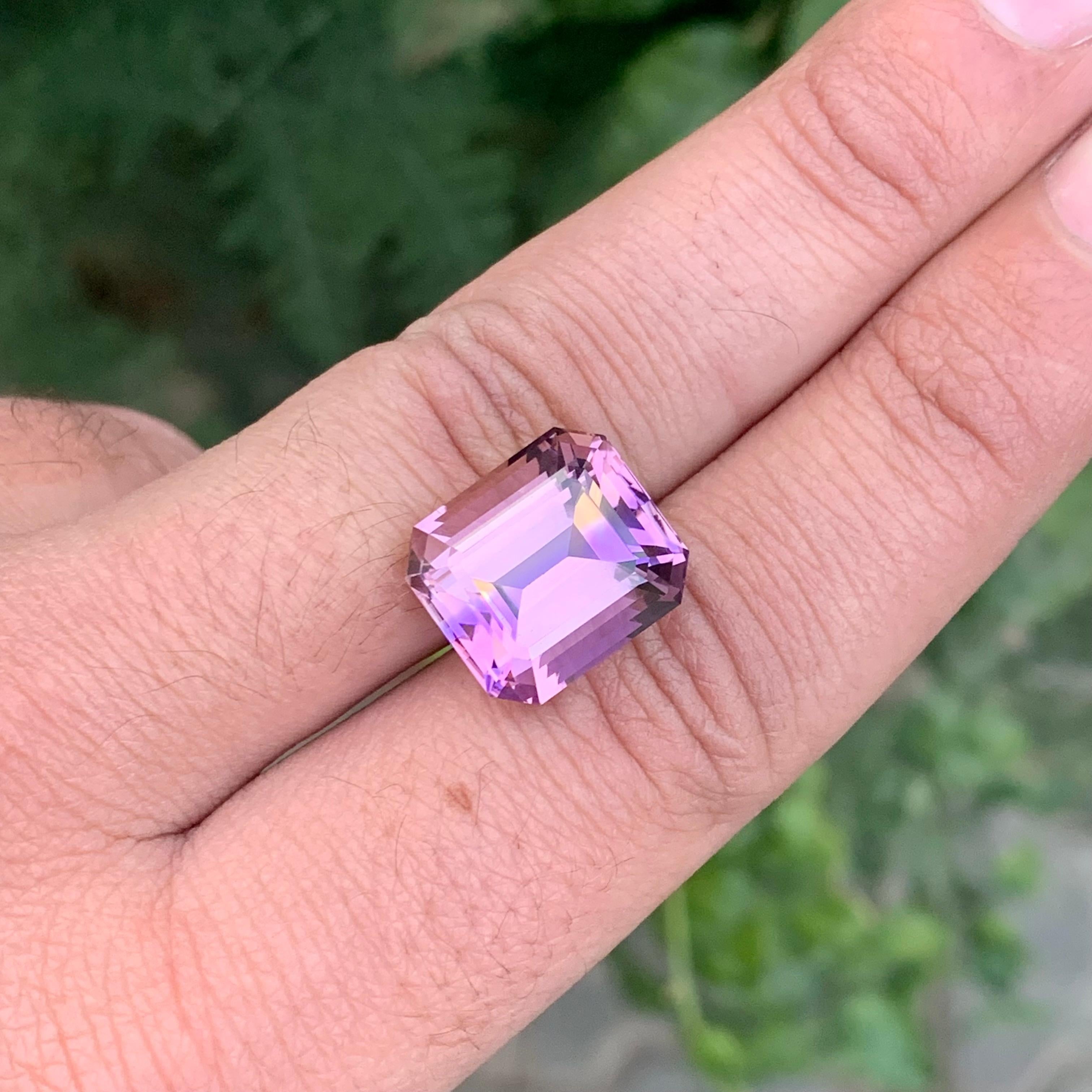 Faceted Ametrine

Weight: 13.35 Carats
Dimension: 14.9 x 13.2 x 10 Mm
Origin: Brazil
Color: Purple & Yellow
Treatment: Non
Certficate: On Demand
Cut: Asscher 
.
Ametrine is a unique and captivating gemstone that displays a harmonious blend of two
