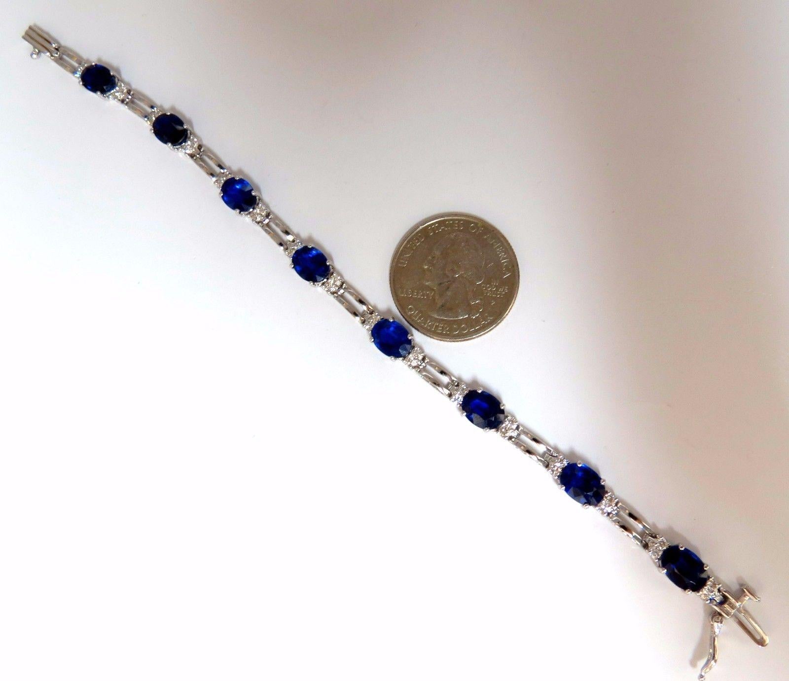 Kyanite & Diamonds Tennis.

12.48ct. Natural Kyanites bracelet.

Oval, full cuts 

Clean clarity

Transparent & Vivid Kashmere Blues.

 average: 8 X 6mm

8 count.



.88ct Diamonds

Rounds & full cuts

Vs-2 clarity.

G-colors.

14kt. white gold