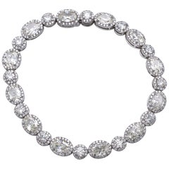 13.36 Carat Oval and Round Diamond 18 Karat Gold Tennis Bracelet