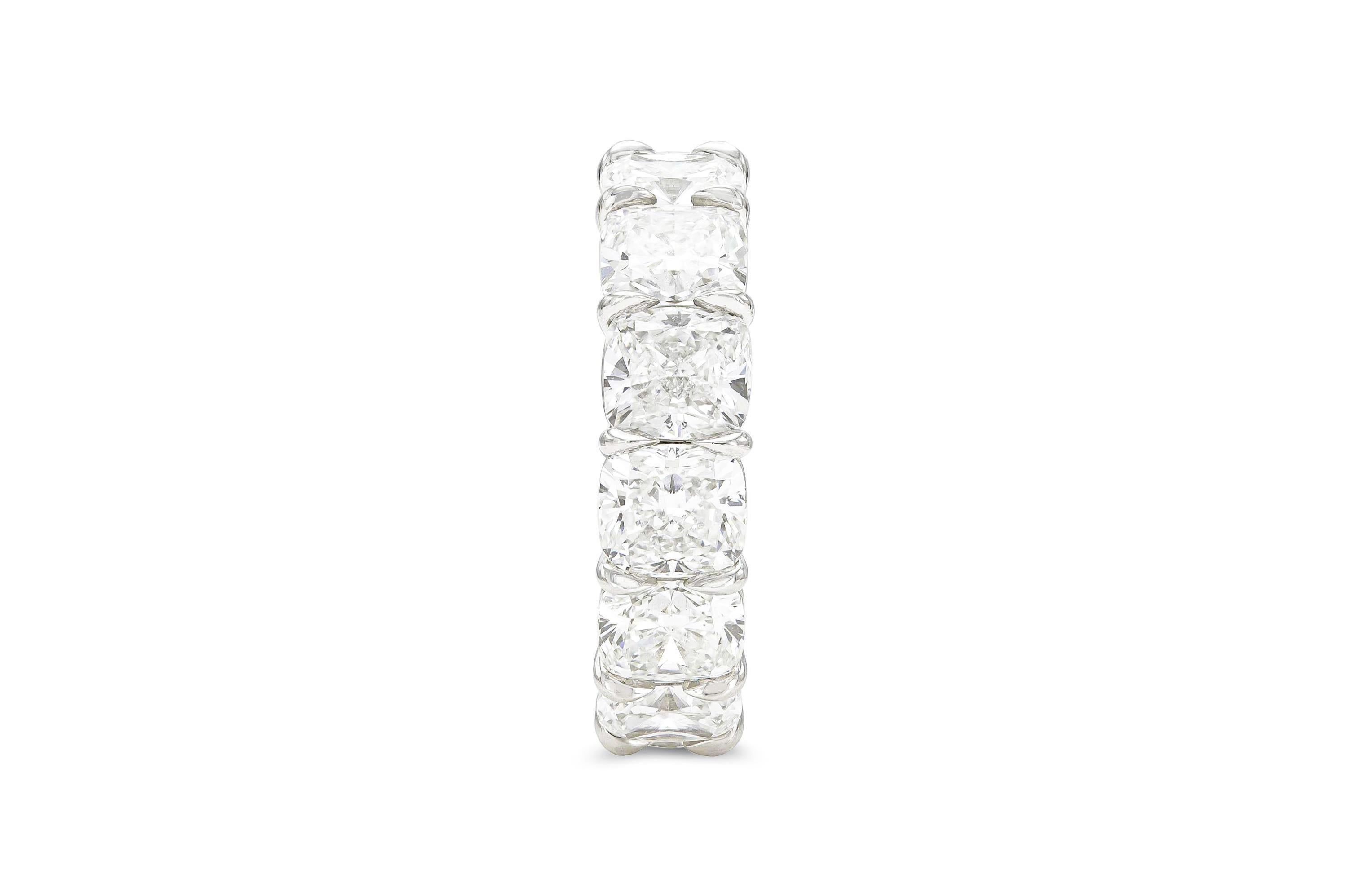 Finely crafted in platinum with 13 GIA certified Cushion cut Diamonds weighing a total of 13.38 carats, D-E-F color, VVS1-VS2 clarity.
6 mm wide
Size 5 3/4