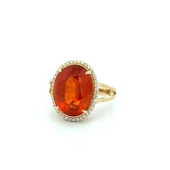 Anello vintage in oro con granato mandarino ovale e diamanti da 13,39 carati
