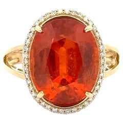 Anello vintage in oro con granato mandarino ovale e diamanti da 13,39 carati