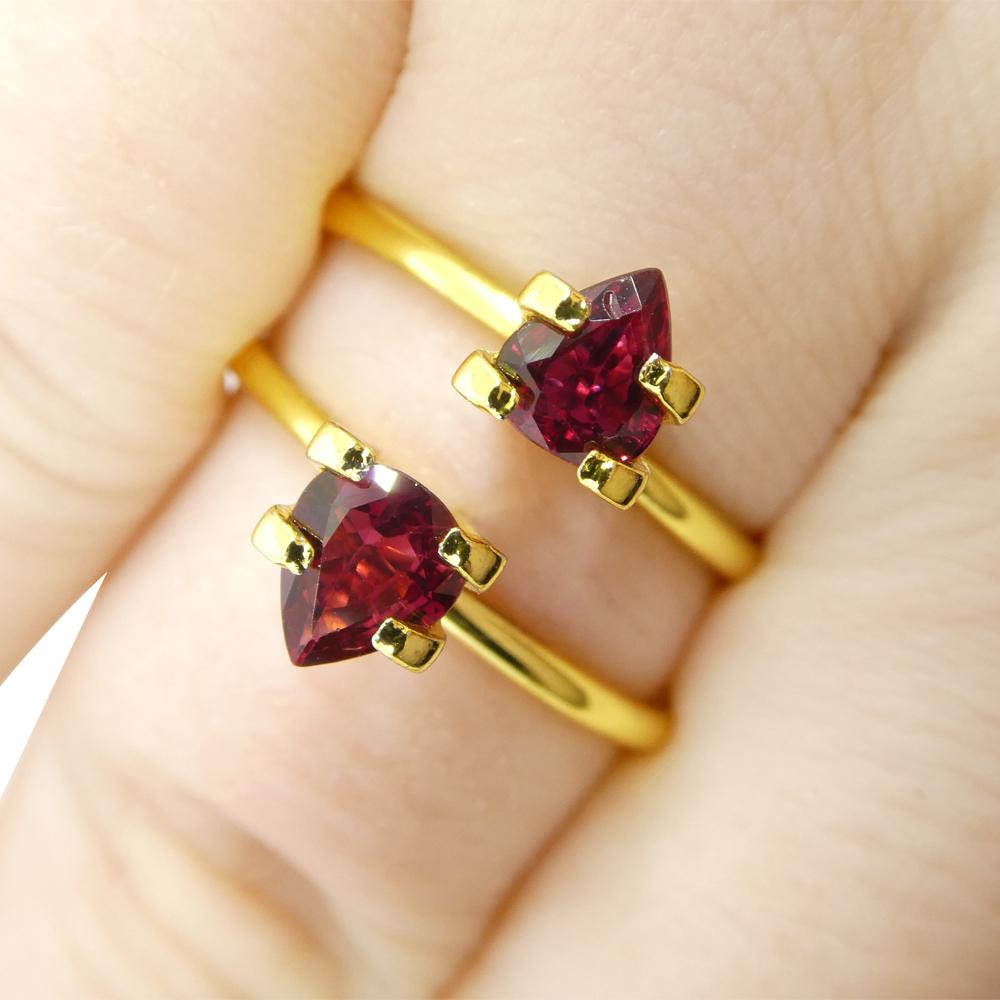 Description:

Gem Type: Ruby 
Number of Stones: 2
Weight: 1.33 cts
Measurements: 6.23 x 5.20 x 2.57 mm, 5.83 x 4.88 x 2.84 mm
Shape: Pear
Cutting Style Crown: Brilliant Cut
Cutting Style Pavilion: Step Cut 
Transparency: Transparent
Clarity: Very