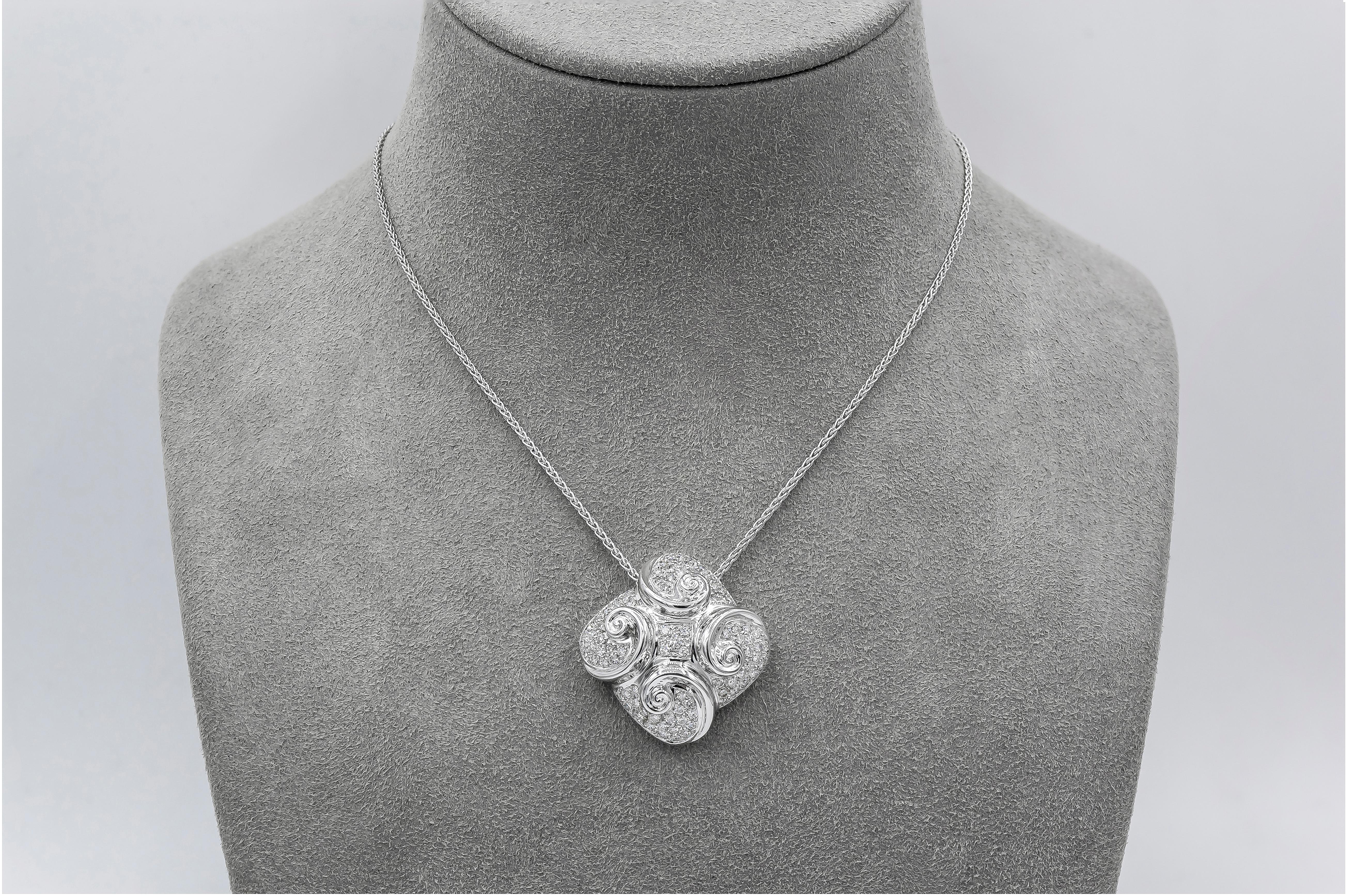 This chic pendant necklace showcasing a fashionable swirl design encrusted with round brilliant diamonds weighing 1.34 carats total. Made in 18 karat white gold. Suspended on an 18 inch white gold chai. 
(adjustable upon request).

Roman Malakov is