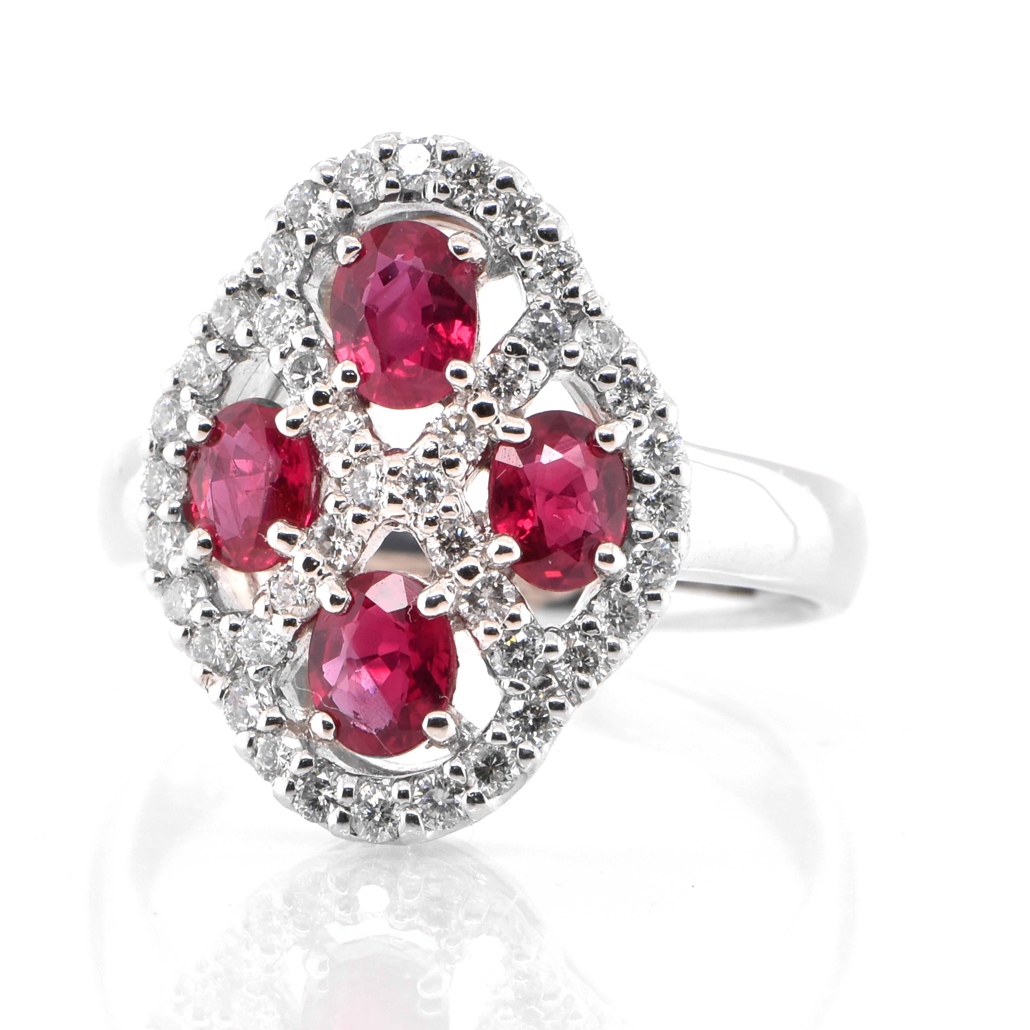 A beautiful Cocktail Ring set in Platinum featuring a total 1.34 Carat Natural Rubies and 0.50 Carats of Diamond Accents. Rubies are referred to as 