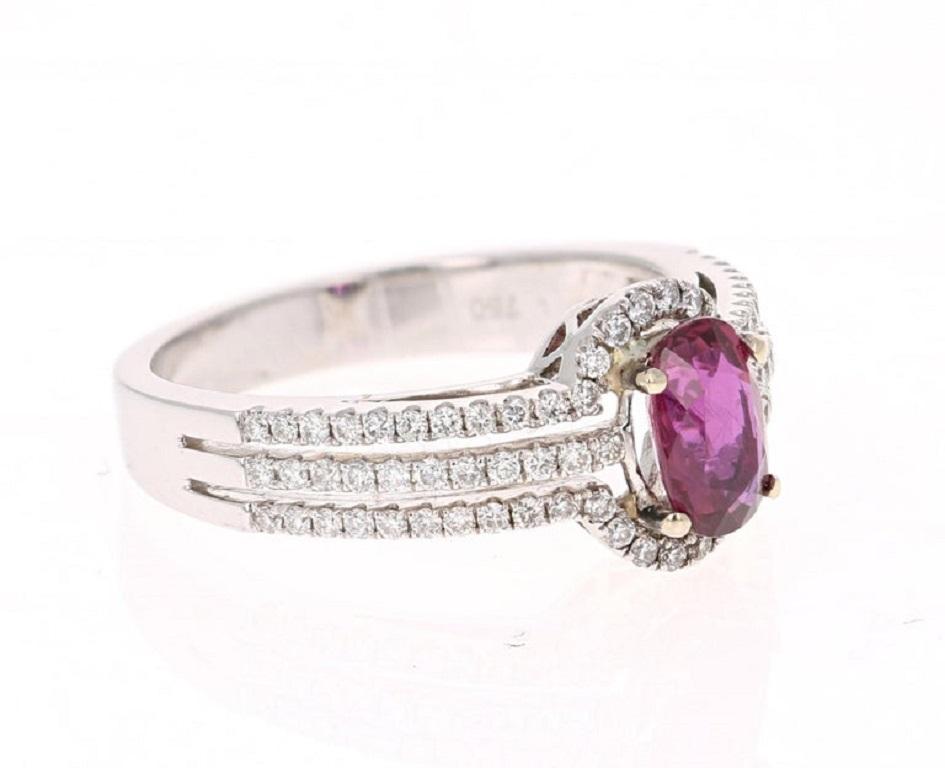 This ring has a beautiful Oval Cut Ruby that weighs 0.93 carats and is surrounded by 78 Round Cut Diamonds that weigh 0.41 carats. The total carat weight of the ring is 1.34 carats.

The ring is casted in 14K White Gold and weighs approximately 4.6