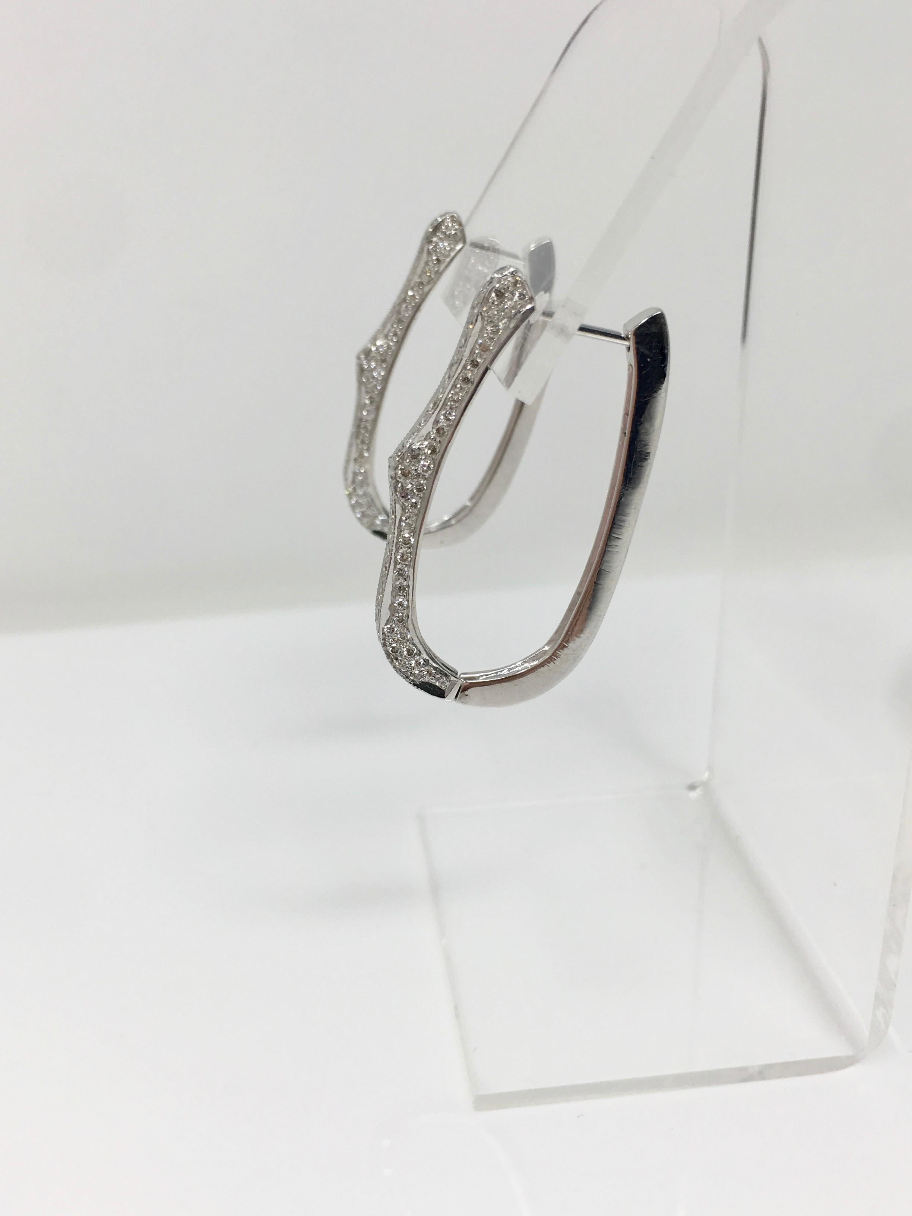Women's 1.34 Carat White Round Brilliant diamond Hoop Earrings In 18K White Gold.  For Sale