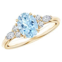 1.34 CTW Oval Aquamarine Side Stone Ring with Diamonds in 14K Solid Gold