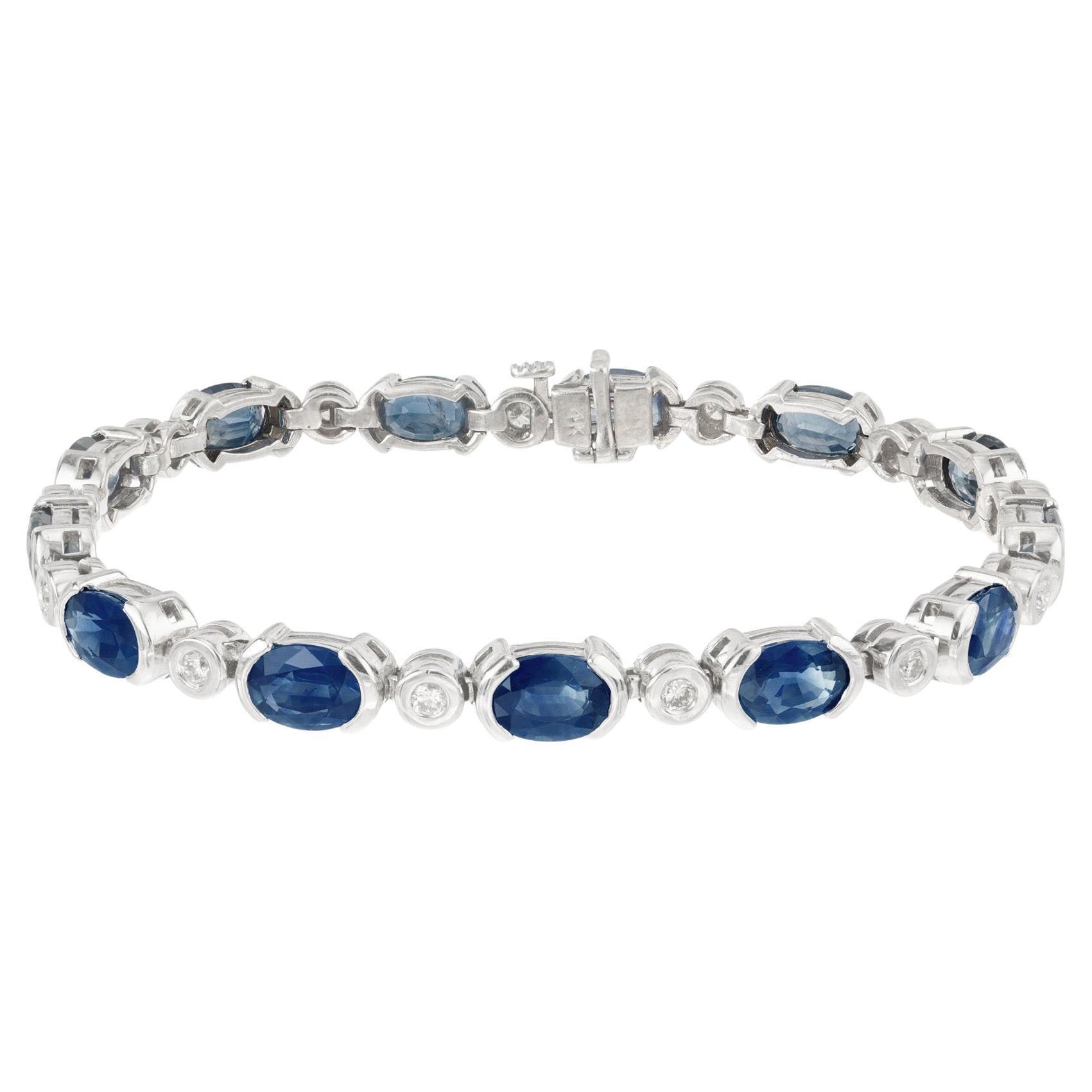 Goldarmband mit 13,40 Karat ovalem blauem Saphir und rundem Diamanten in Röhrenfassung