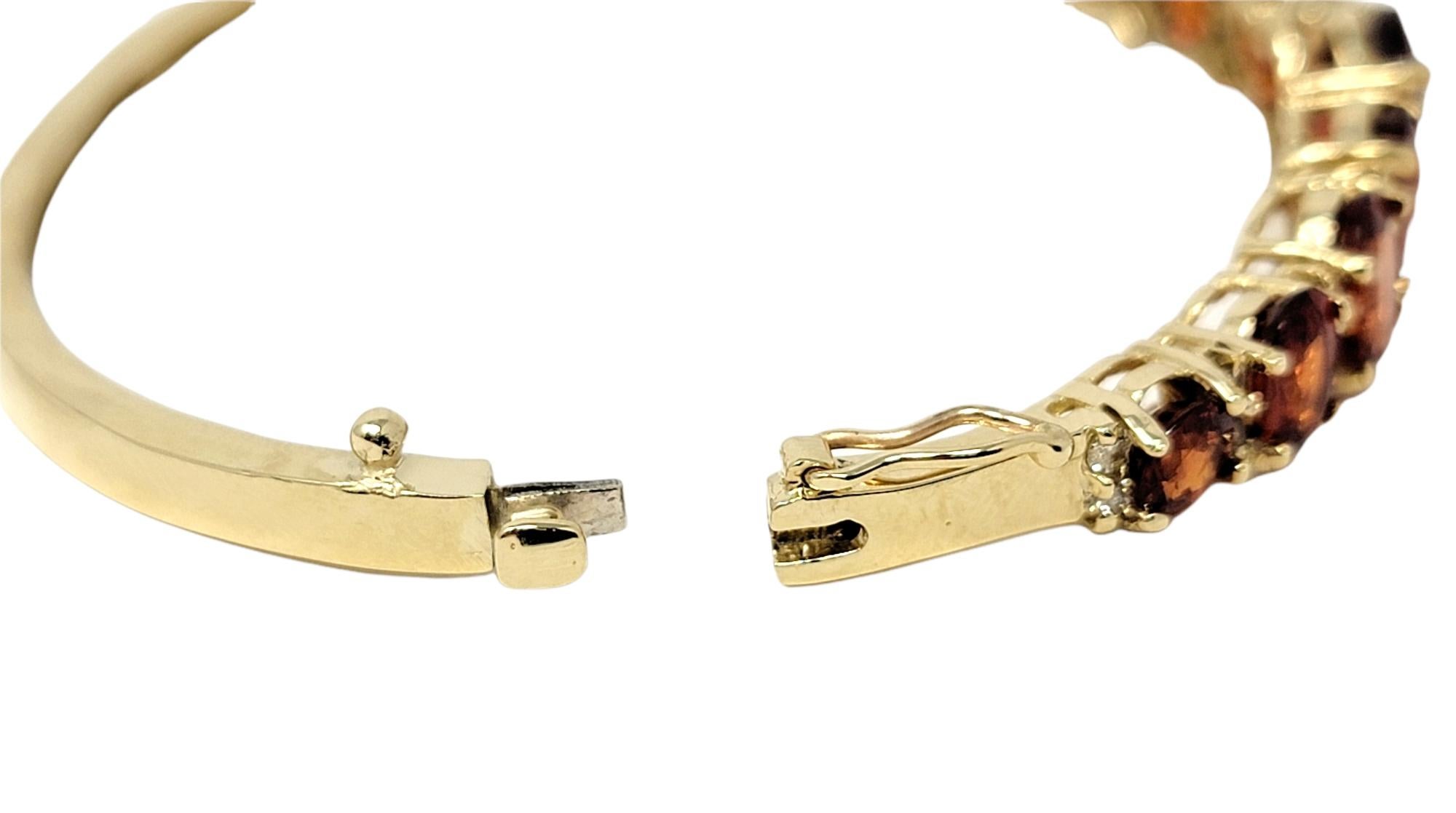 Women's 13.40 Carats Total Spessartine Garnet and Diamond Hinged Oval Bangle Bracelet For Sale