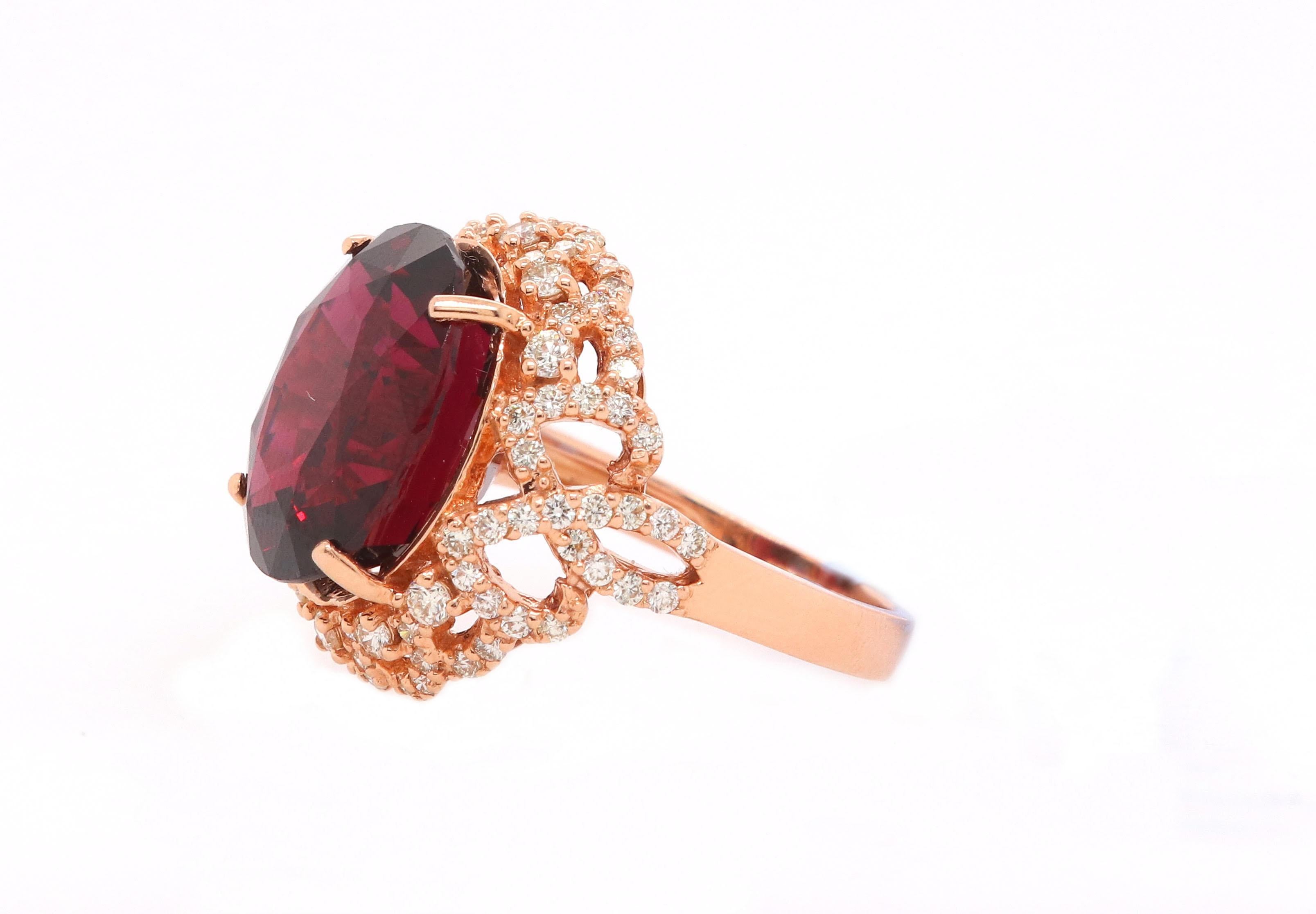Material: 14k Rose Gold 
Center Stone Details: 1 Oval Rubellite at 13.41 Carats  - 15.4 x 12.1 mm
Mounting Diamond Details: 92 Round White Diamonds Approximately 0.97 Carats - Clarity: SI / Color: H-I
Ring Size: Size 6.5. Alberto offers